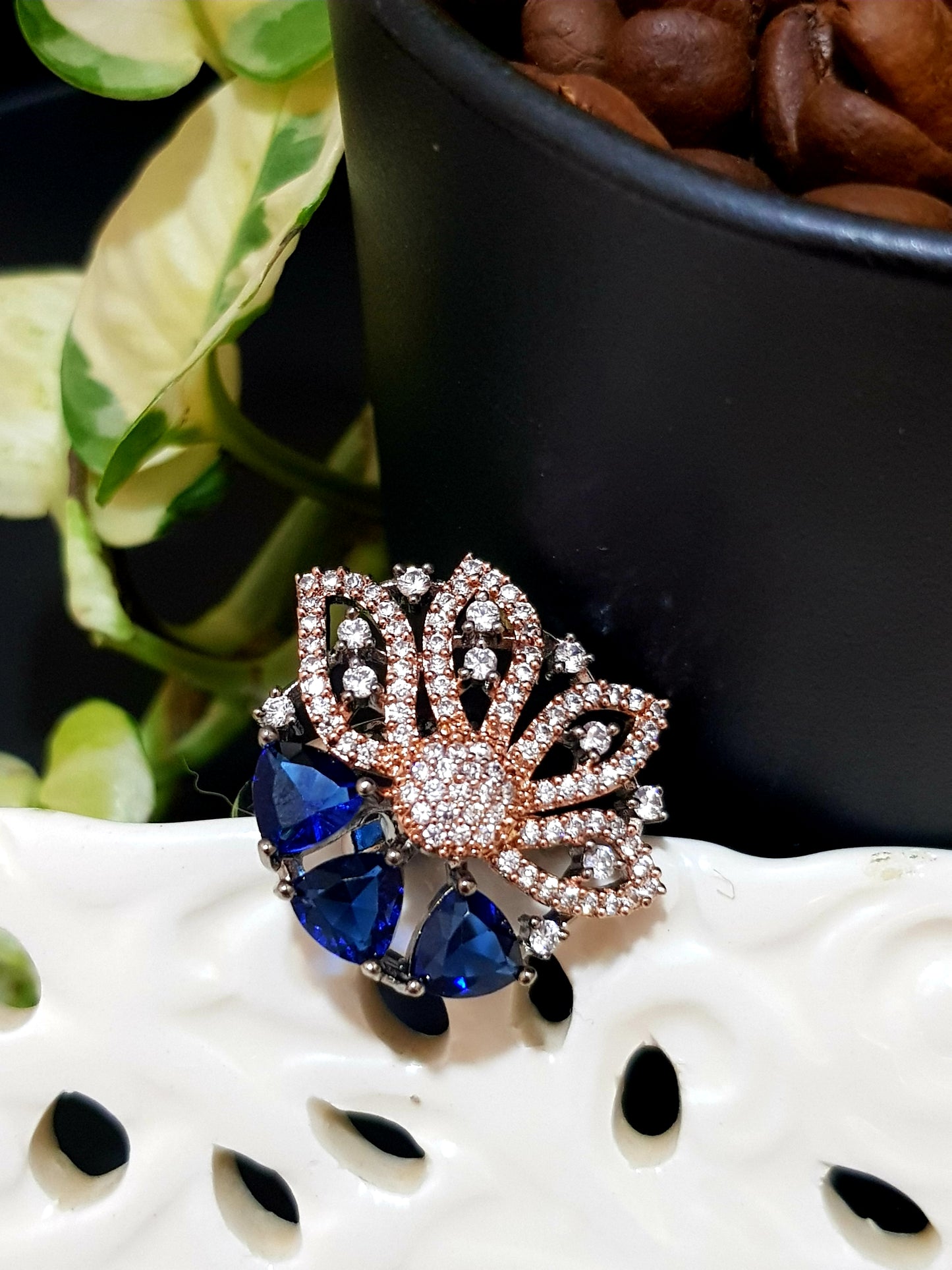 Antique rose gold finish ring with 3 triangular sapphire/emerald/ruby with CZ embellished flower pattern