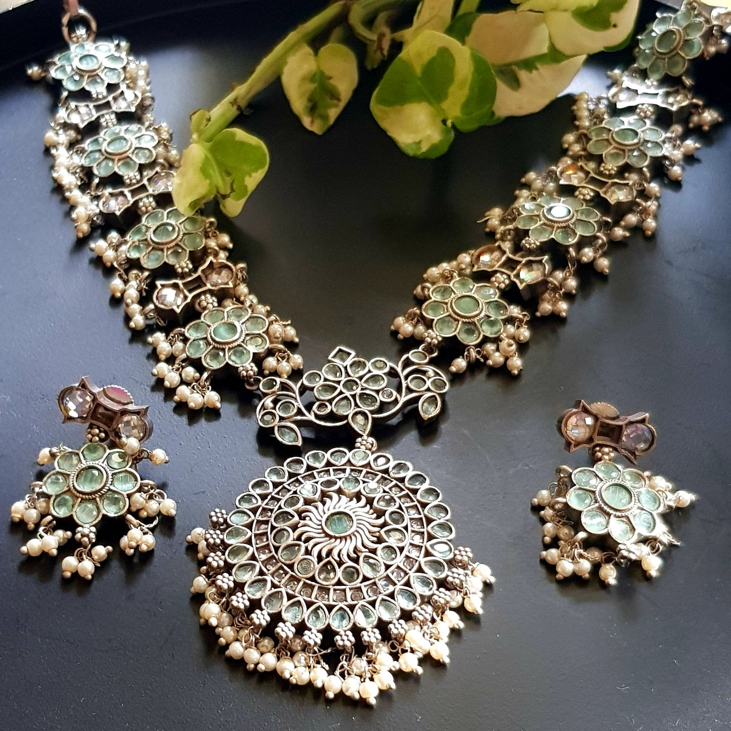 Antique silver finish set, flower motif long necklace with mint green stone inlay and pearl beads, matching earrings