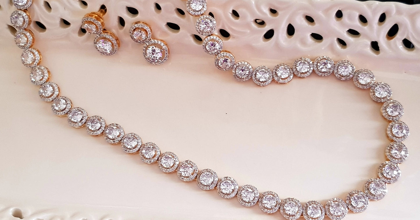 Gold finish set, single strand round crystal necklace with matching earrings