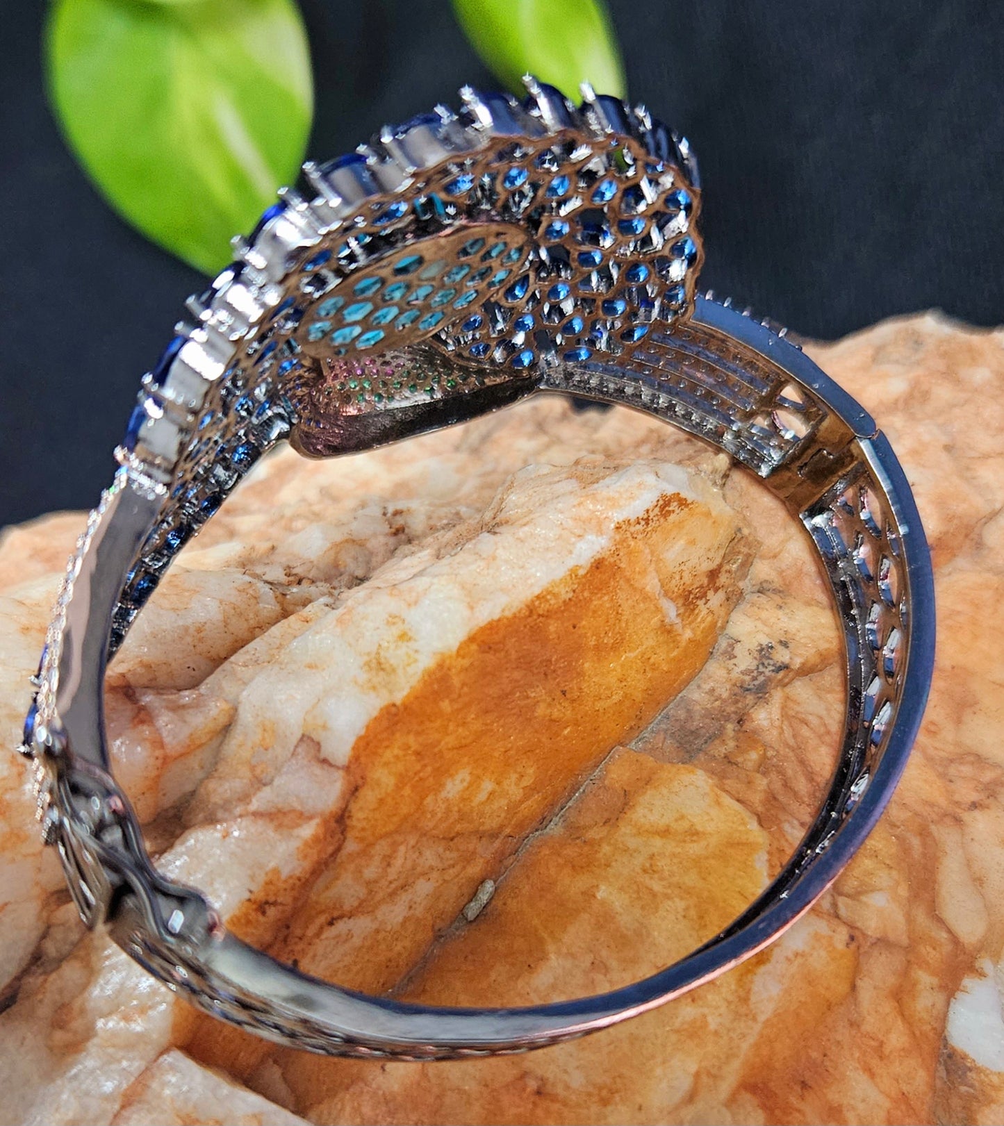 Antique finish platinum kara (bangles), dancing peacock design with different stone variants