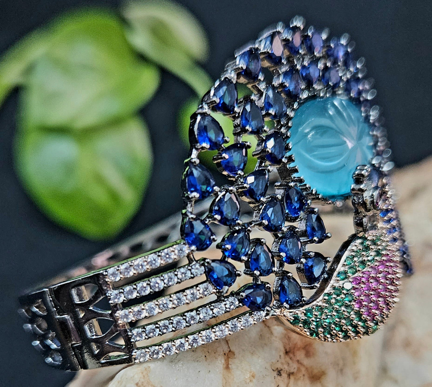 Antique finish platinum kara (bangles), dancing peacock design with different stone variants