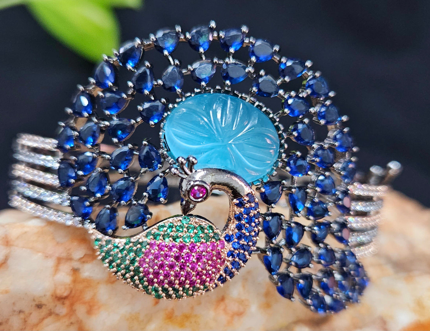 Antique finish platinum kara (bangles), dancing peacock design with different stone variants
