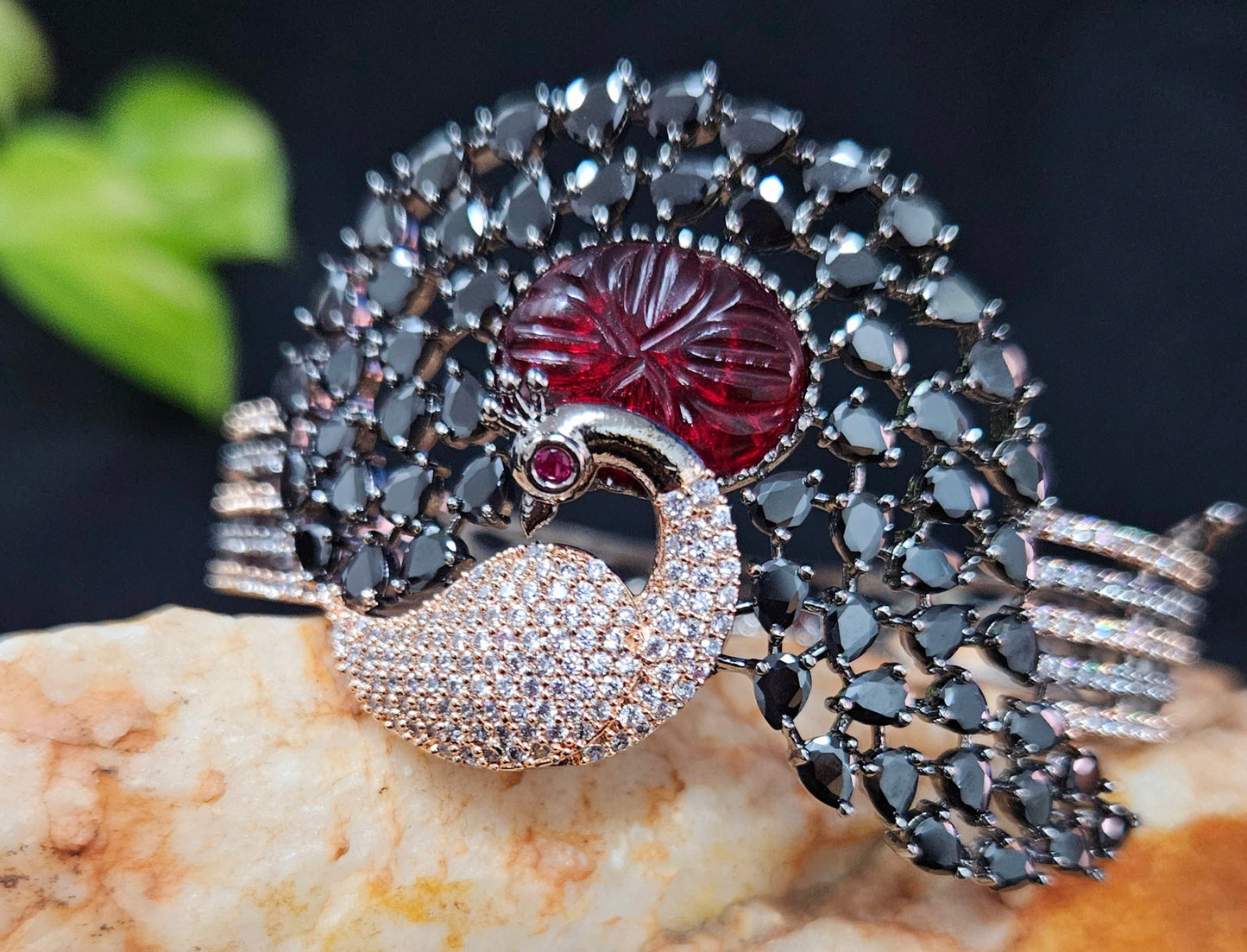 Antique finish platinum kara (bangles), dancing peacock design with different stone variants