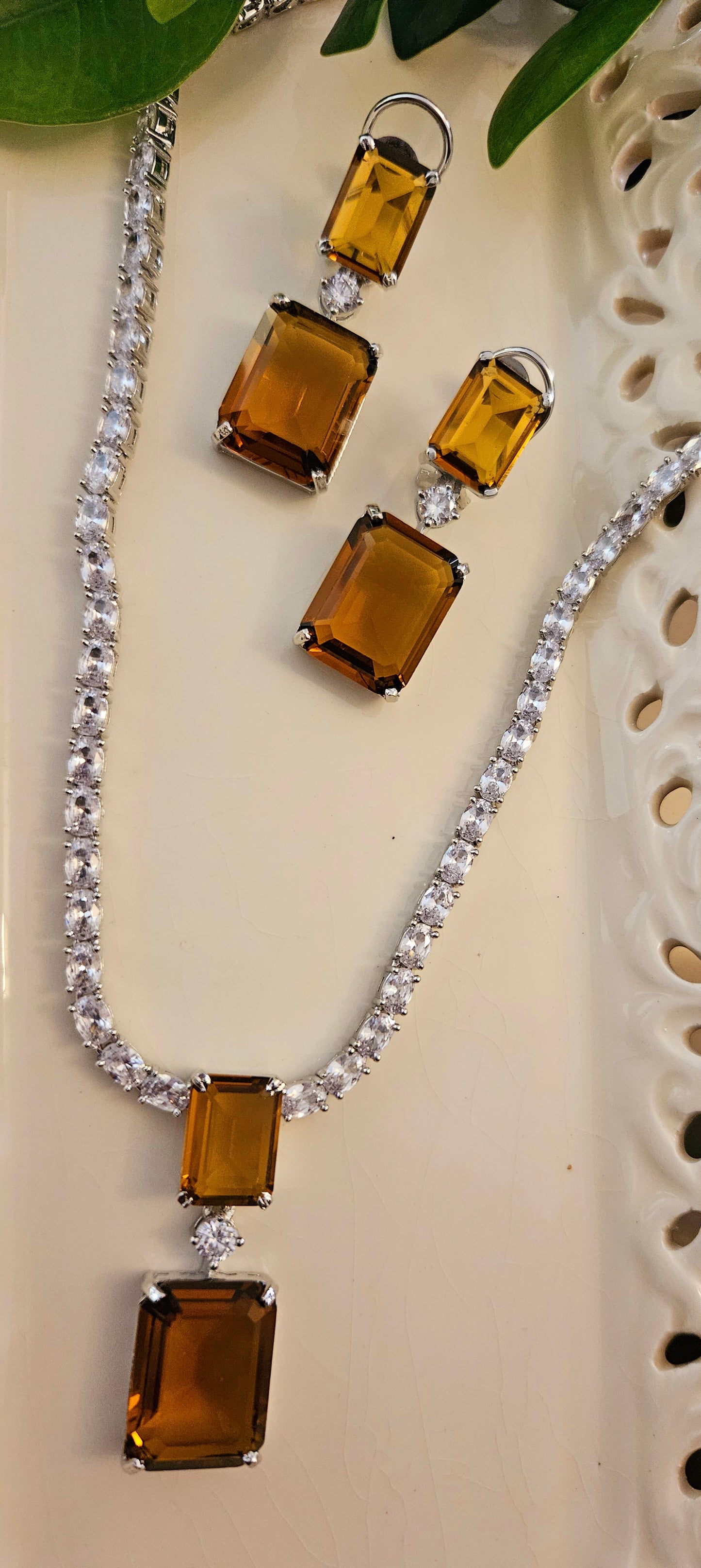 Platinum finish single strand CZ set with dual rectangle topaz/brown stone pendant, matching earrings
