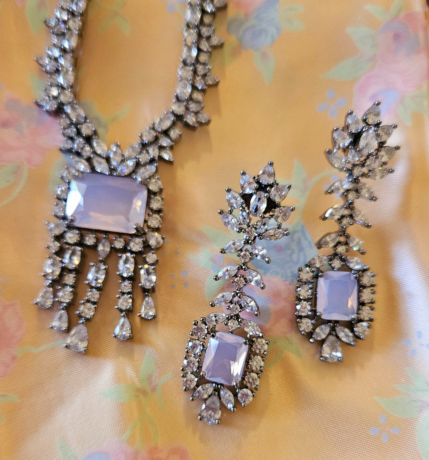 Antique finish set with big rectangular pale pink/sky blue pendant with CZ detailing, matching earrings