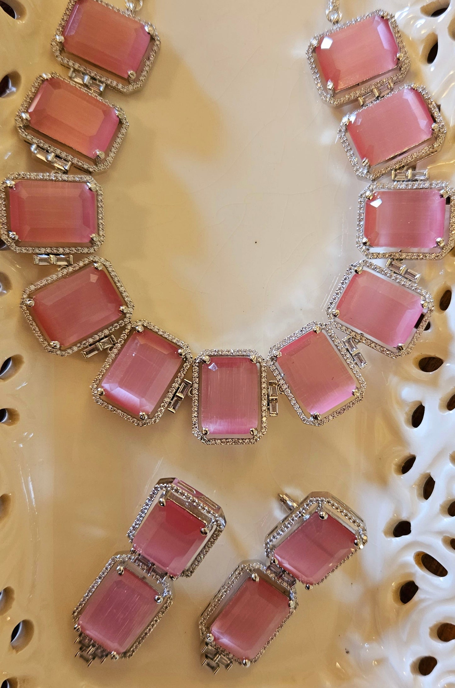 Platinum finish set with square pale pink/mint green stones accentuated with CZ, matching earrings