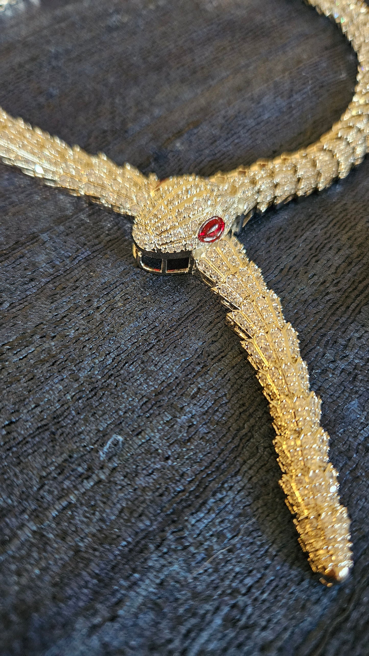 Platinum finish serpent set, necklace has big serpent eye, matching earrings
