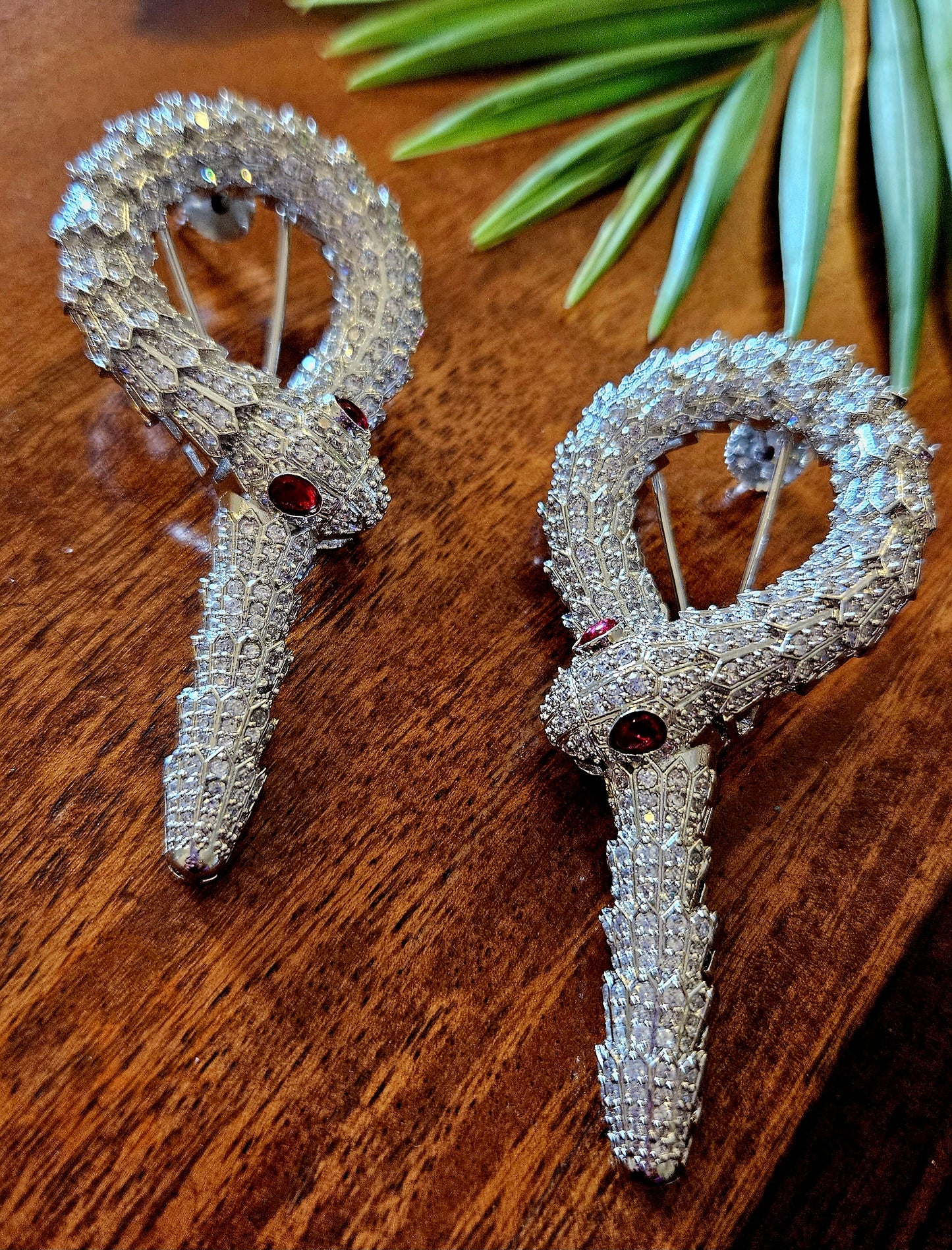 Platinum finish serpent set, necklace has big serpent eye, matching earrings