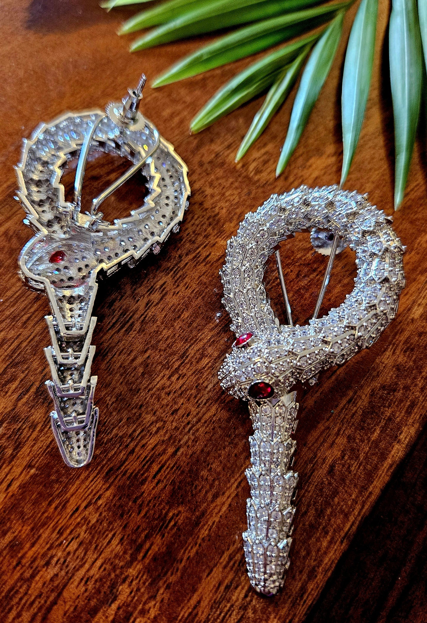 Platinum finish serpent set, necklace has big serpent eye, matching earrings