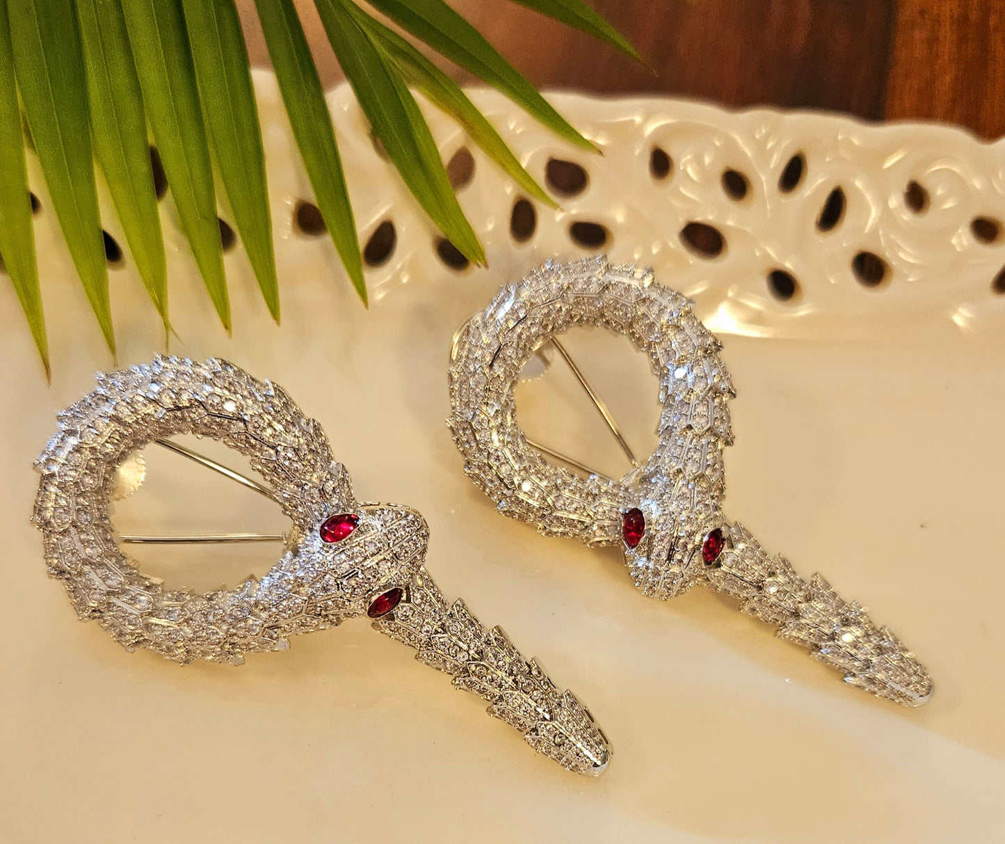 Platinum finish serpent set, necklace has big serpent eye, matching earrings