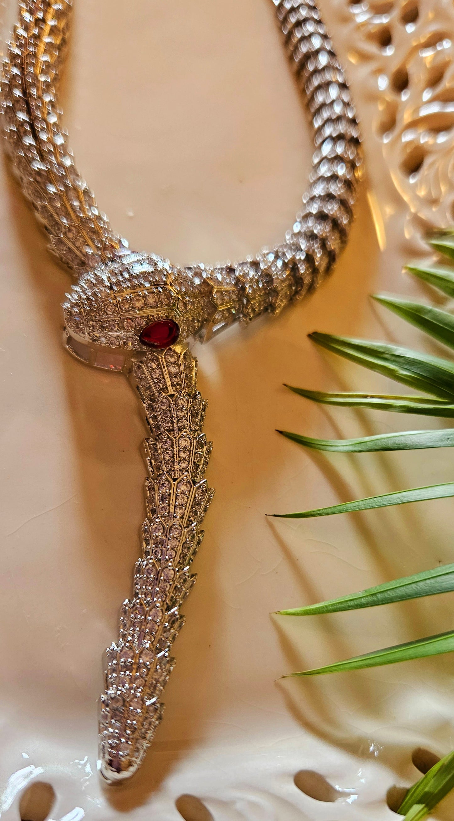 Platinum finish serpent set, necklace has big serpent eye, matching earrings