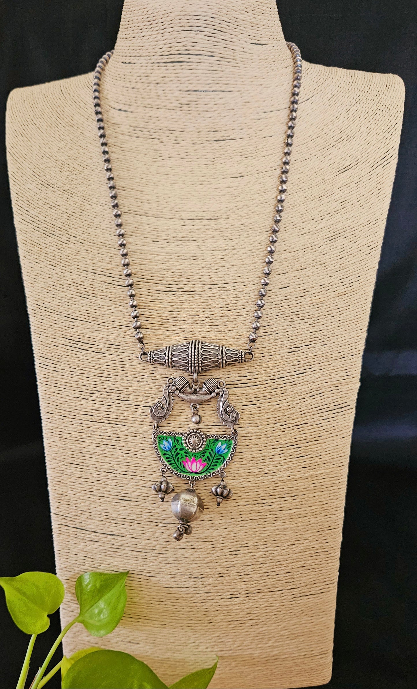 Silver finish long necklace set, green hand-painted pendant with metal globe hanging and damroo held on metal bead chain, matching earrings