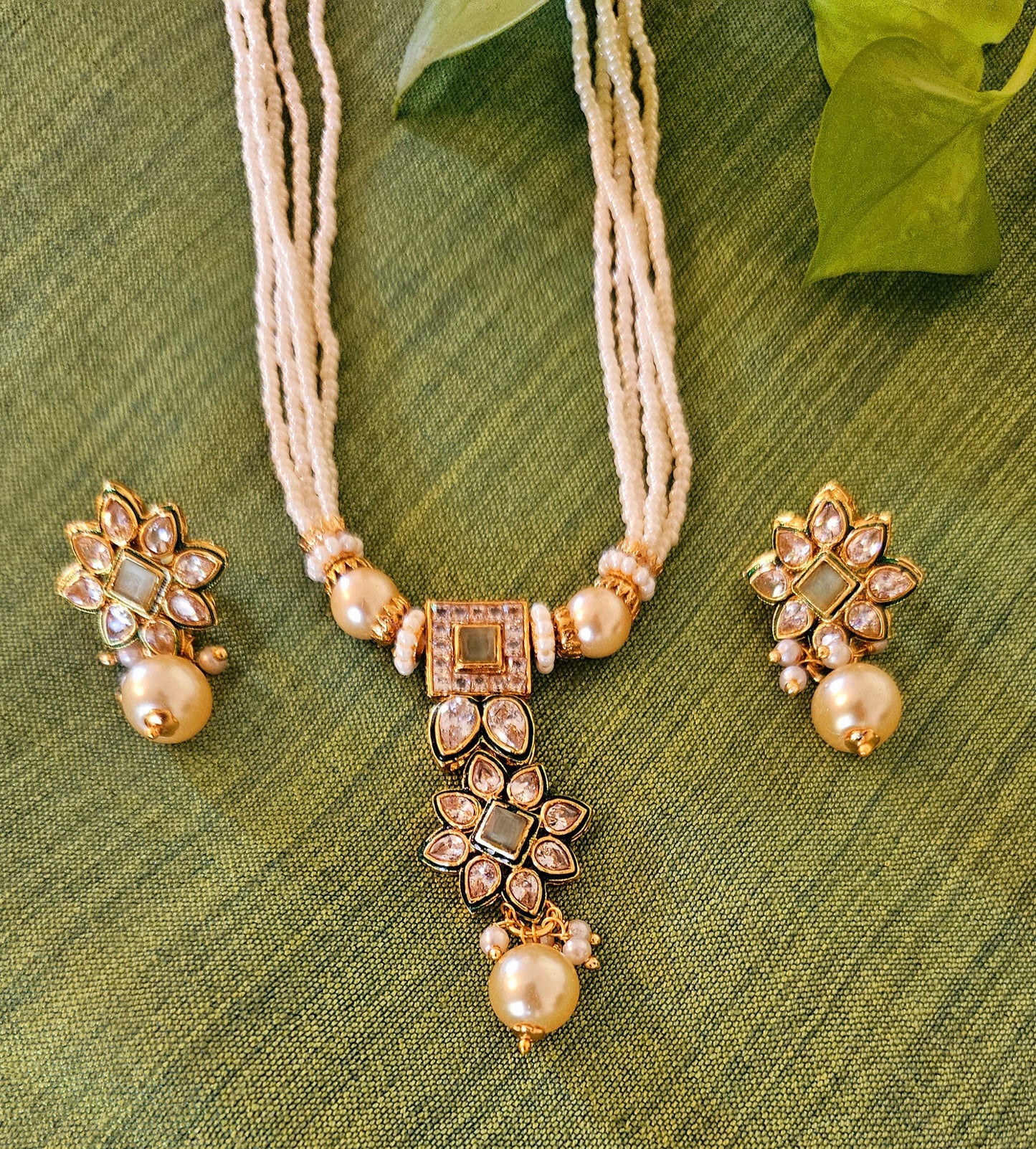 Gold finish pendant set, delicate pendant with mint geen/red stones and kundan pendant, matching earrings