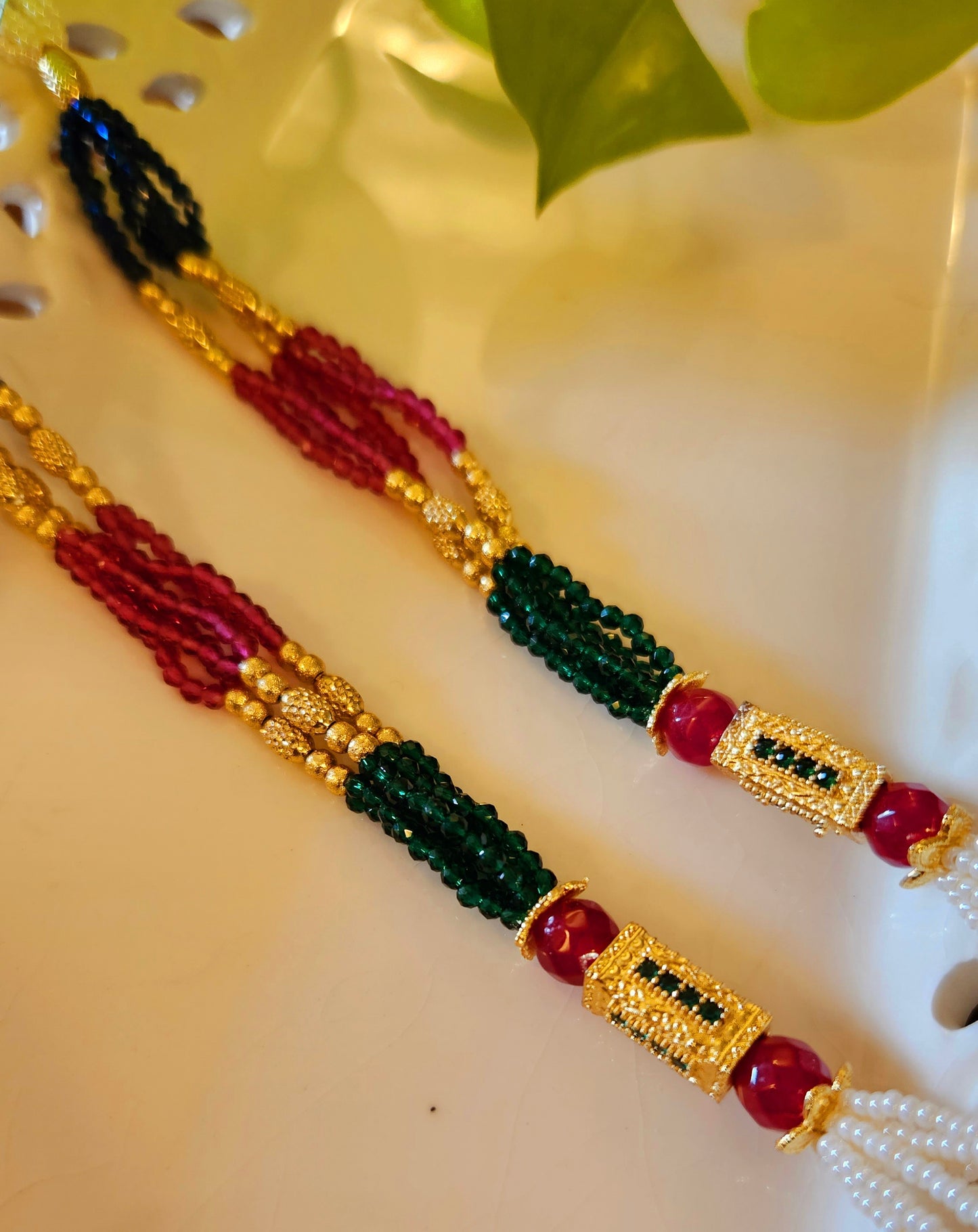 Pearl Pendant set with work of blue/red stone in multiple strands on pearl, blue and red stone, matching earrings