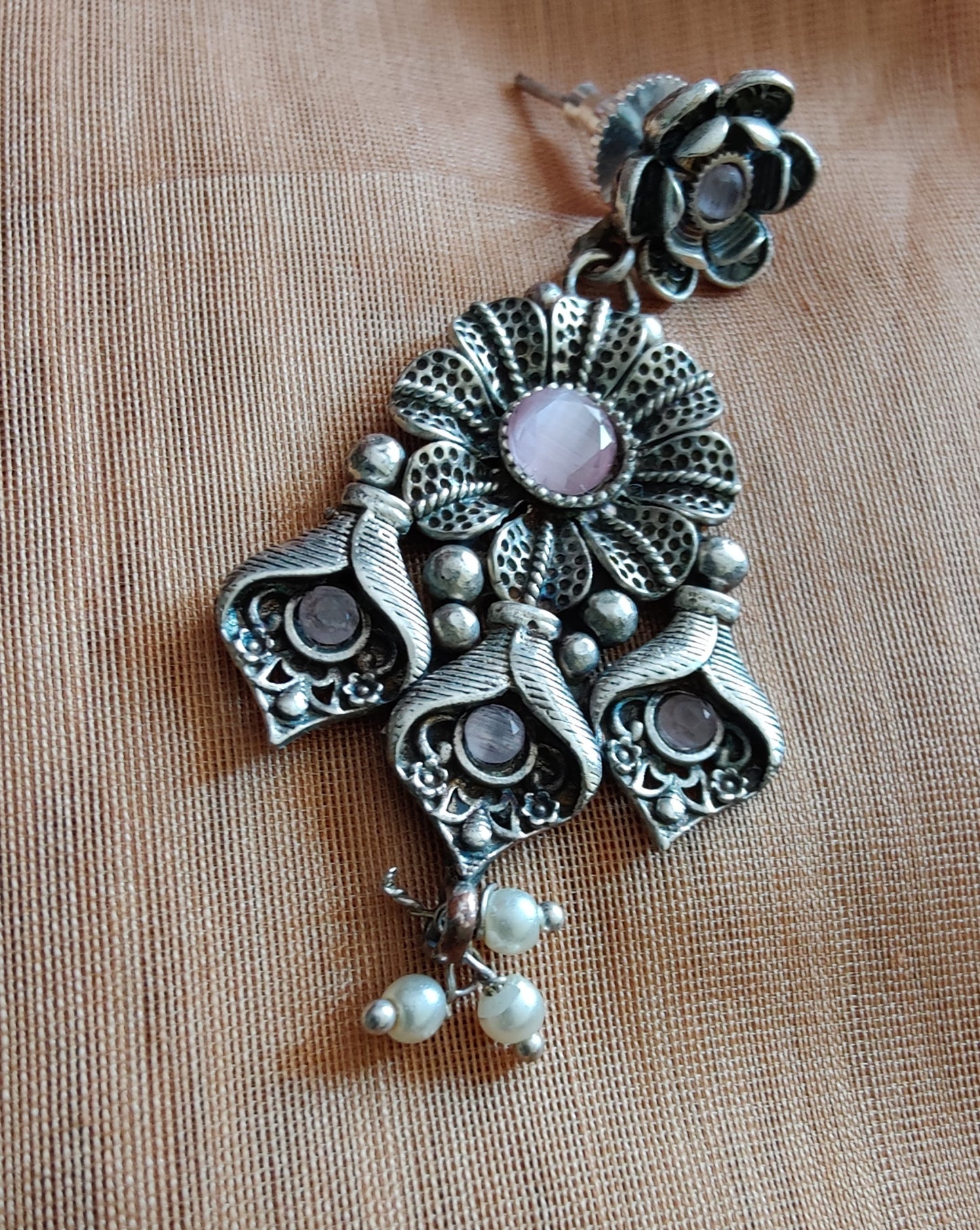 Floral motif long necklace and earrings set in silver finish