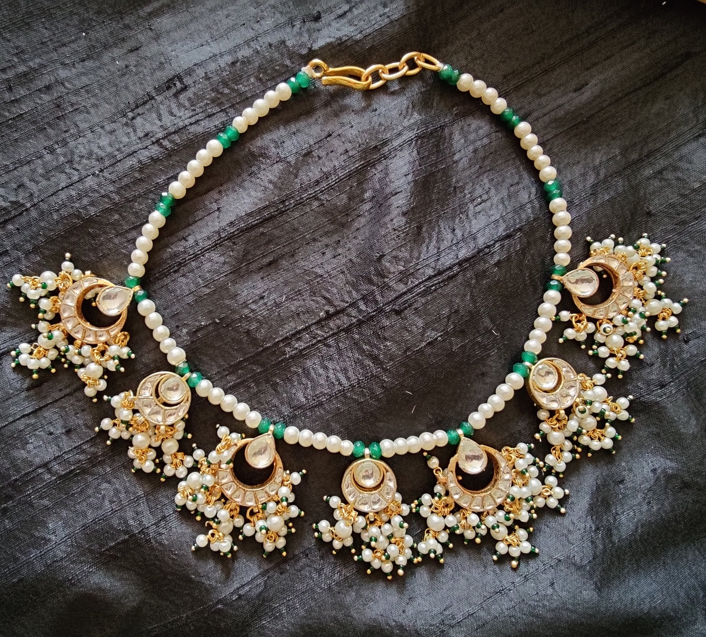 Kundan and pearl necklace and earrings set