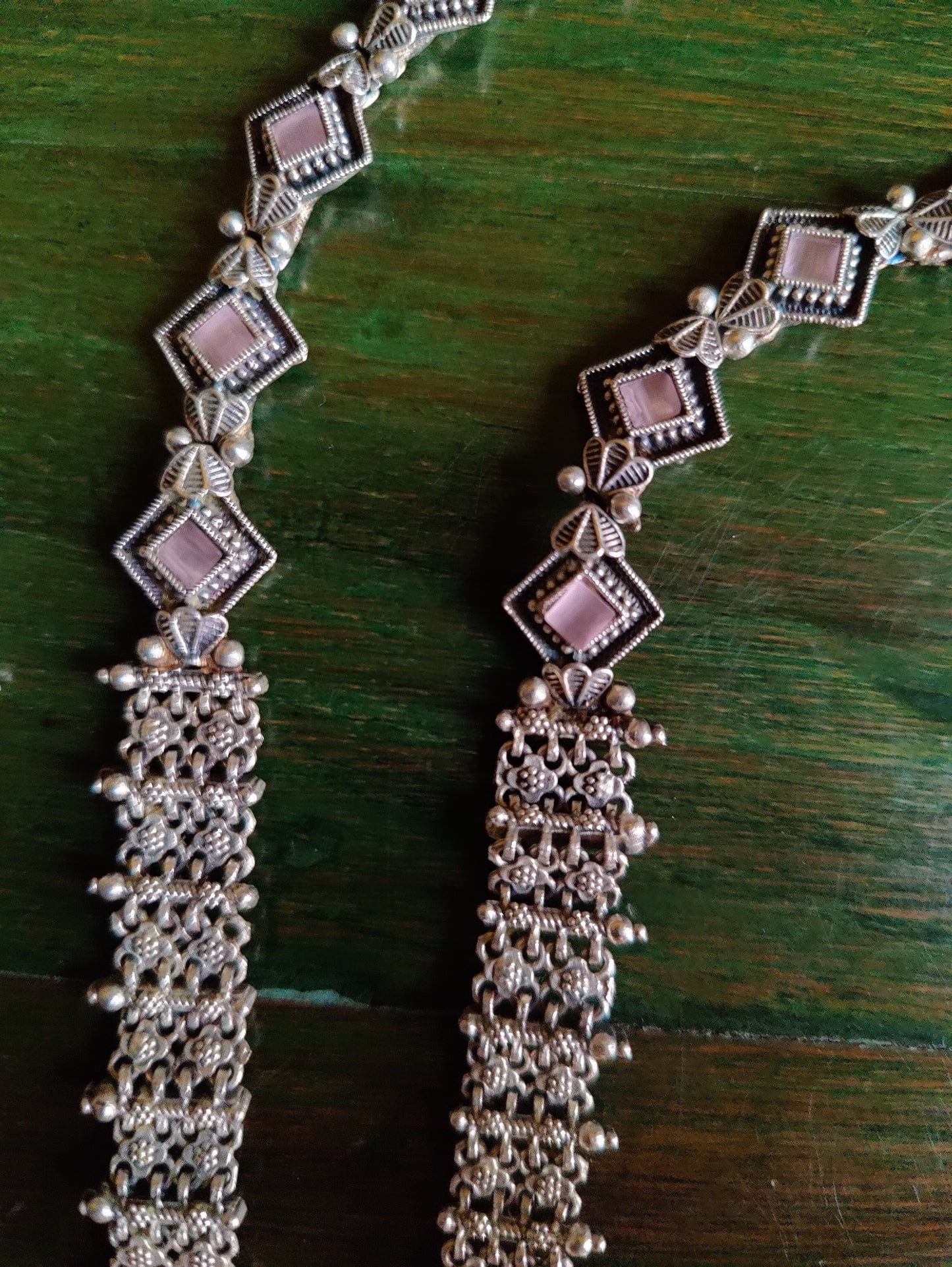 Silver finish set, long necklace with intricate work and pale pink/mint green detailing, matching earrings