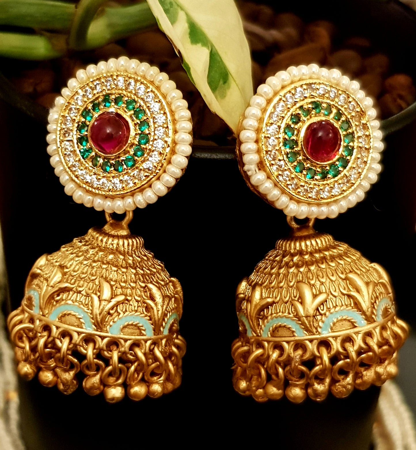 Gold finish set with stone,meenakari and kundan pendant in poth pearl strings with stunning matching jhumkis (earrings)