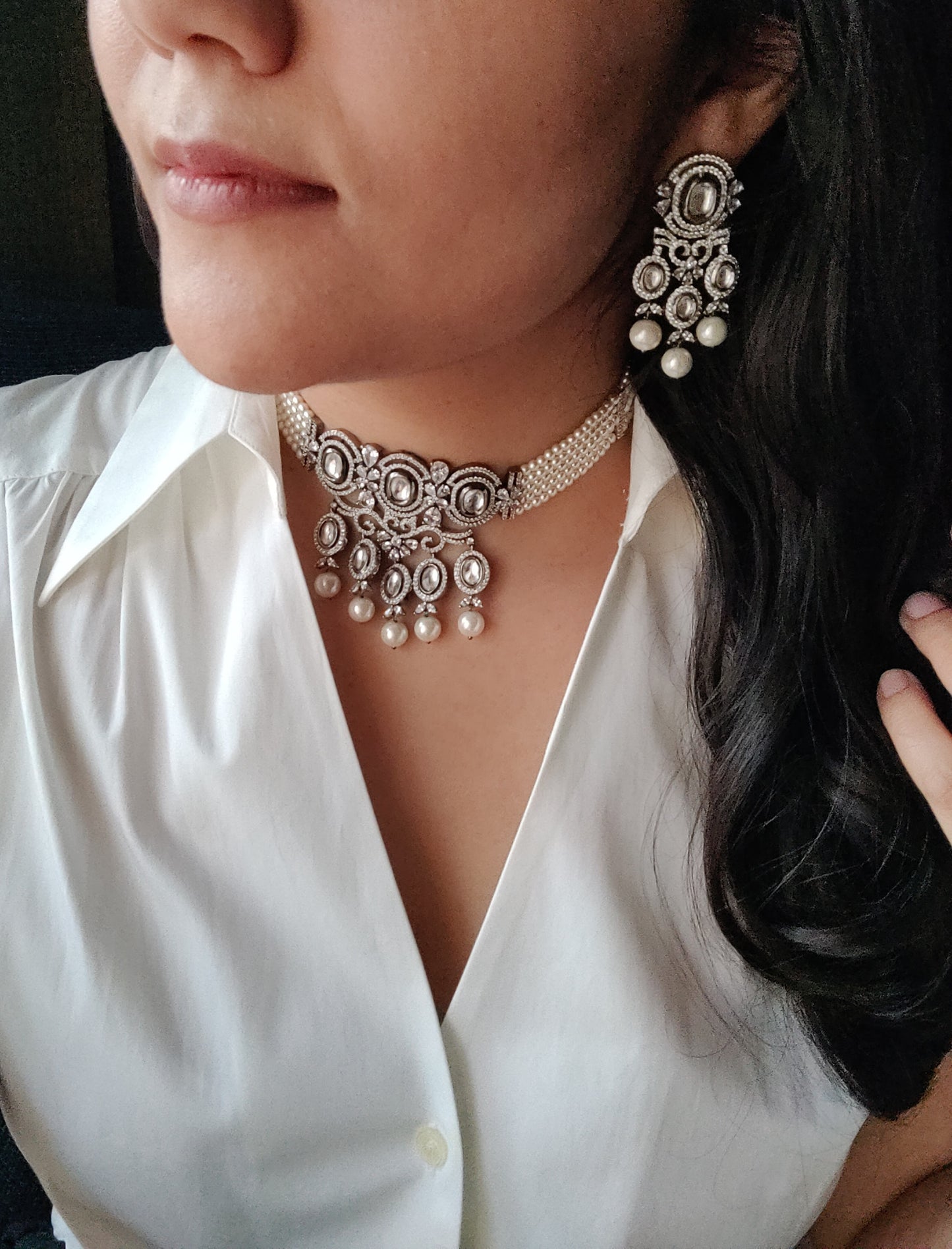 Platinum finish choker set,kundan and CZ detailing with big pearl drops , matching earrings