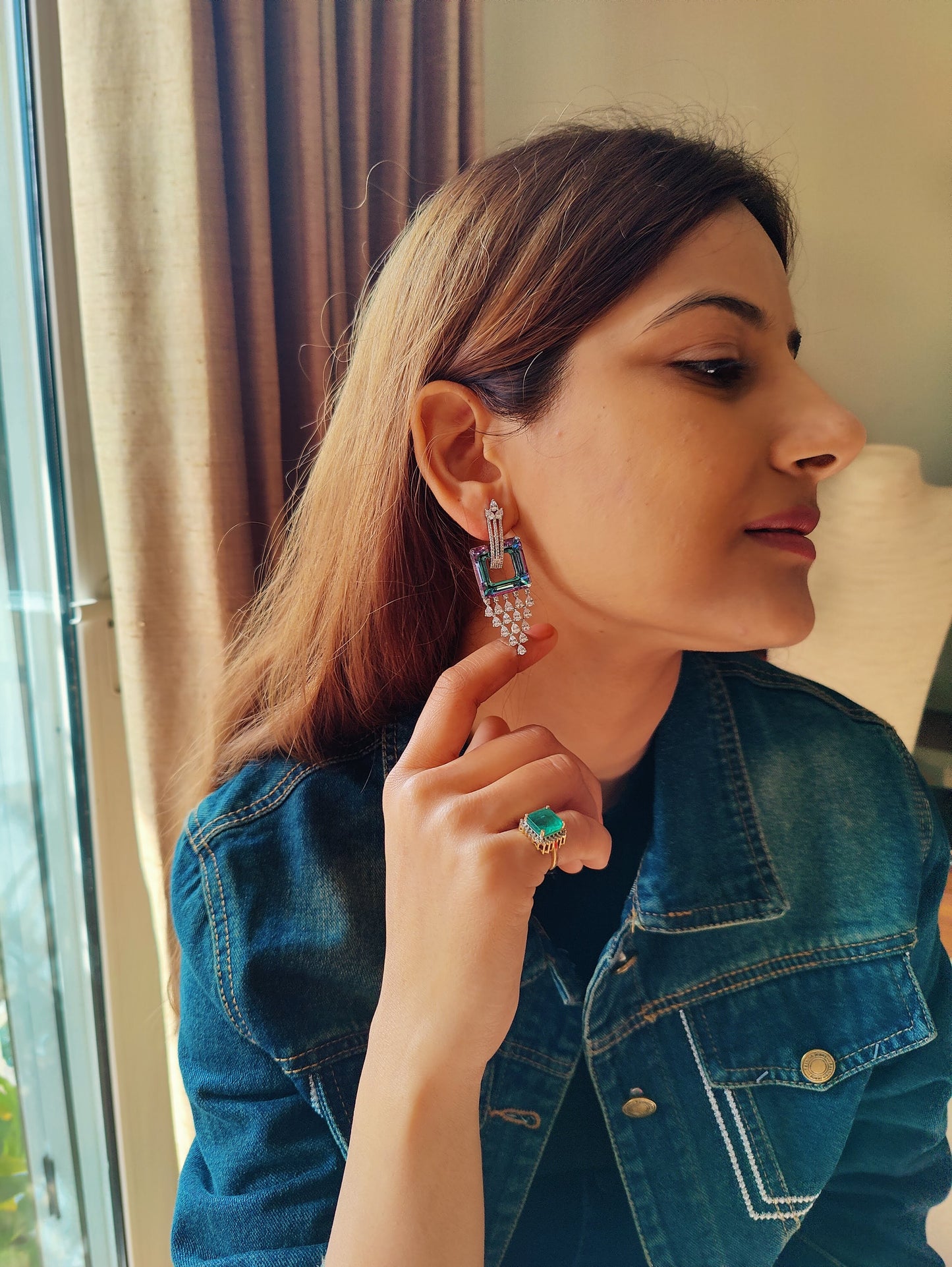 Anadi earrings with a square multi hue crystal