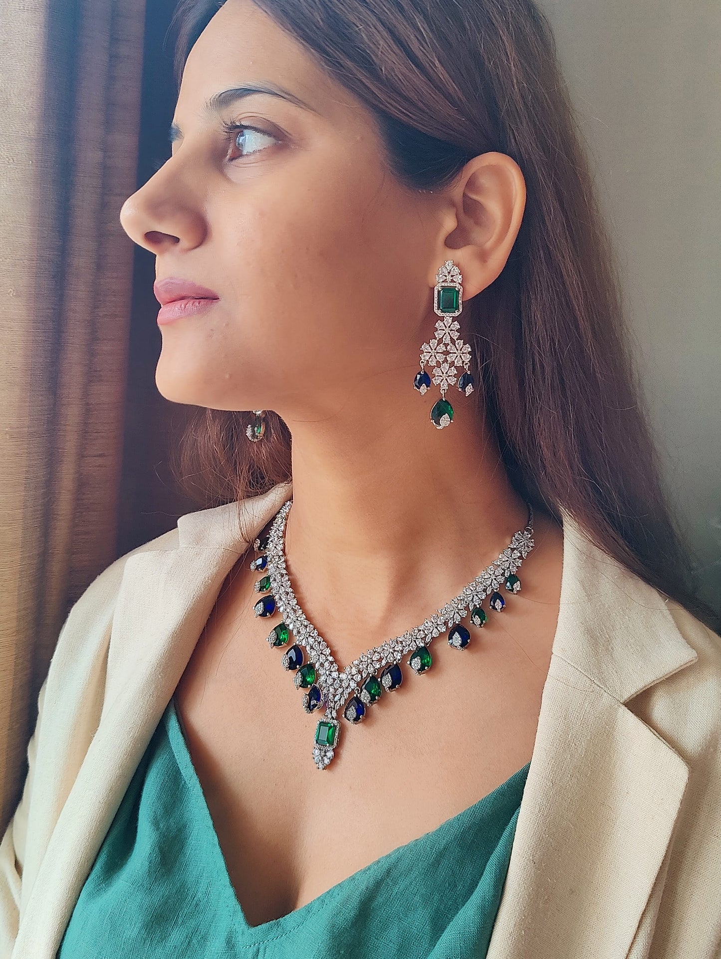 Benazir set with alternating emerald green and sapphire stone drops