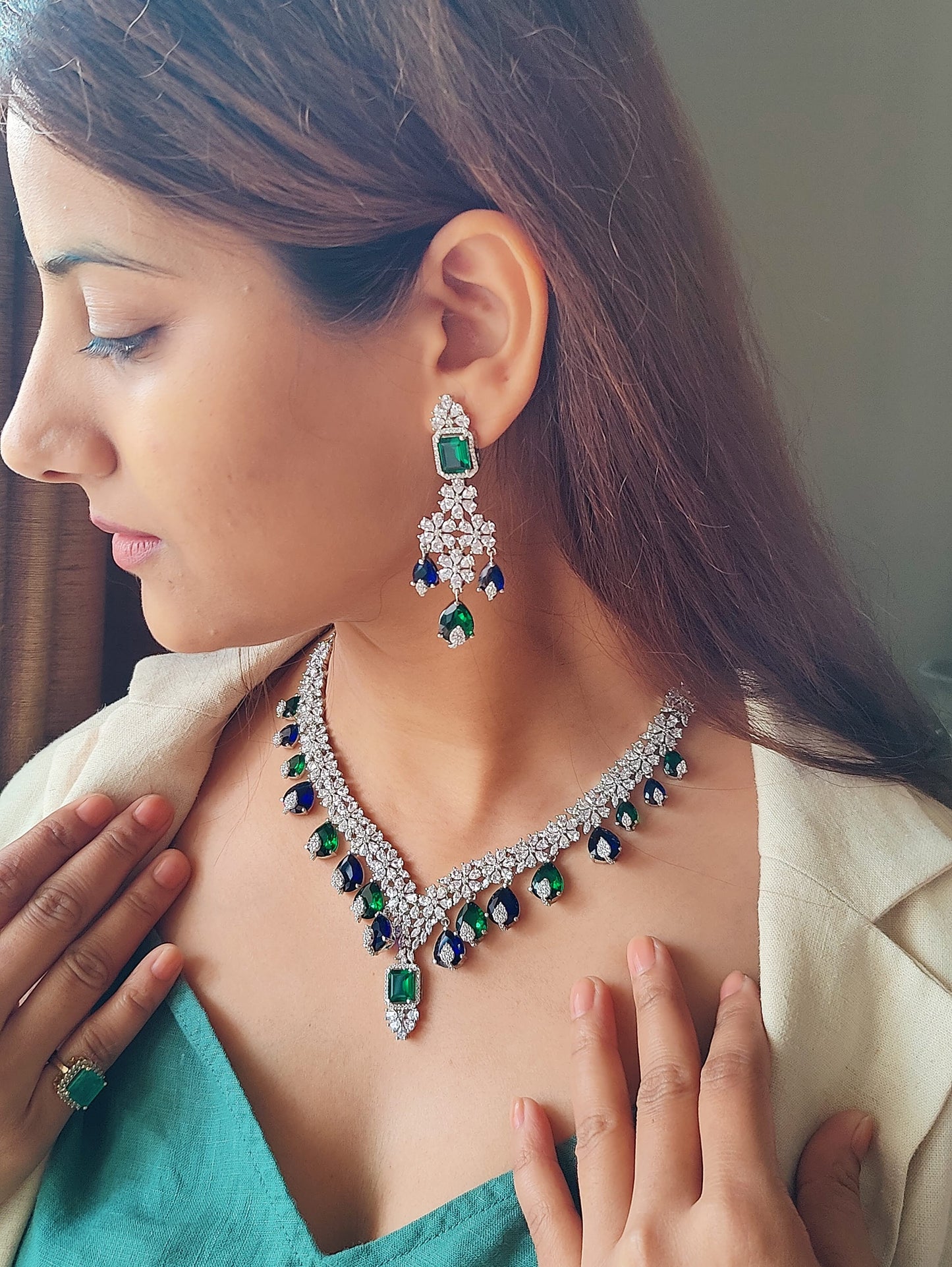 Benazir set with alternating emerald green and sapphire stone drops