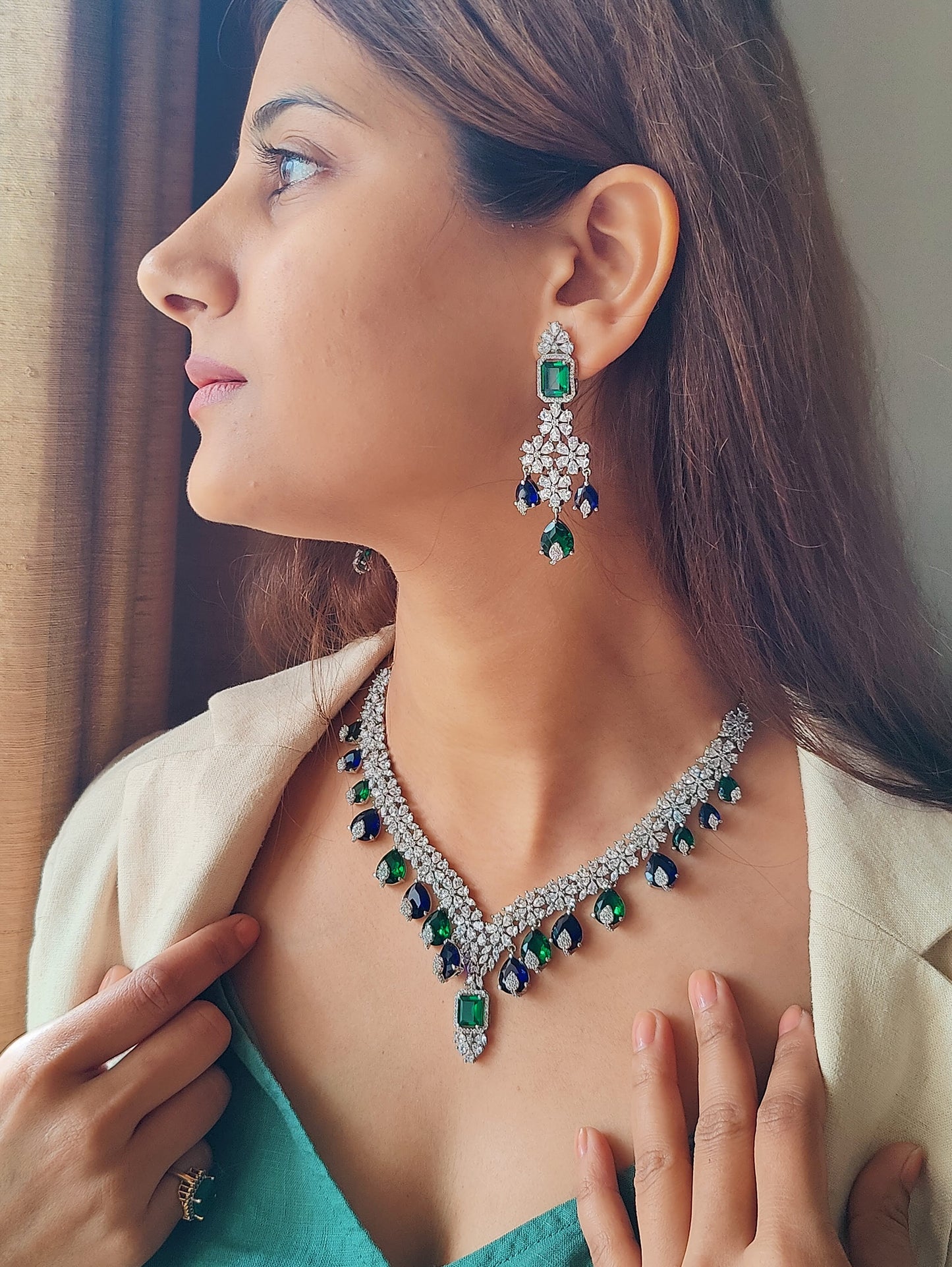 Benazir set with alternating emerald green and sapphire stone drops