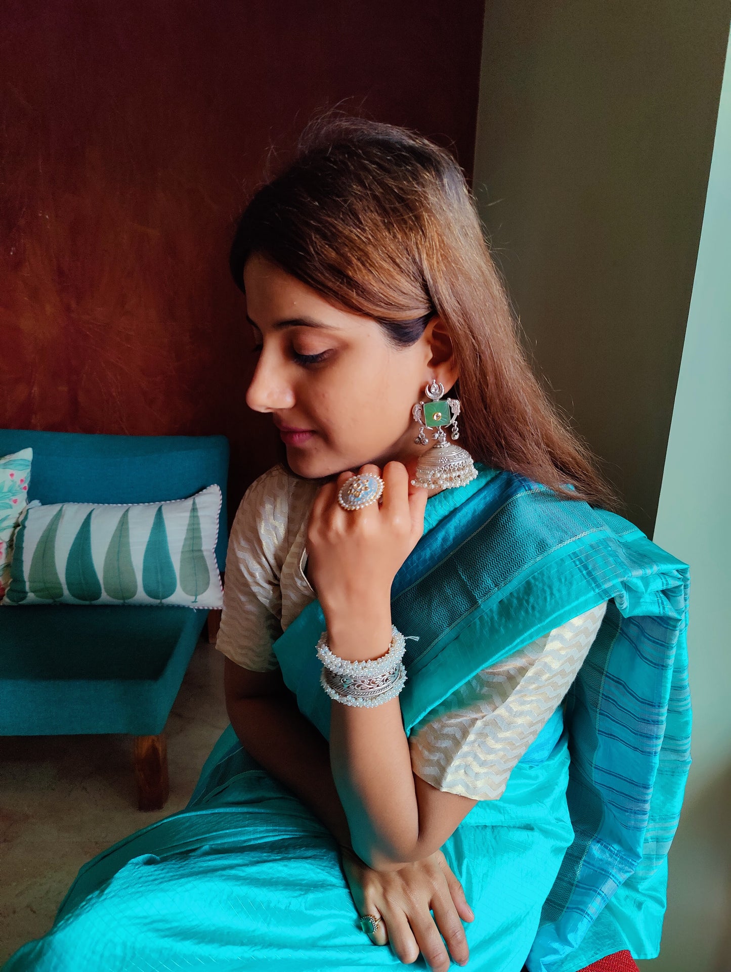 Nazin jhumkas with mint green stone and kundan