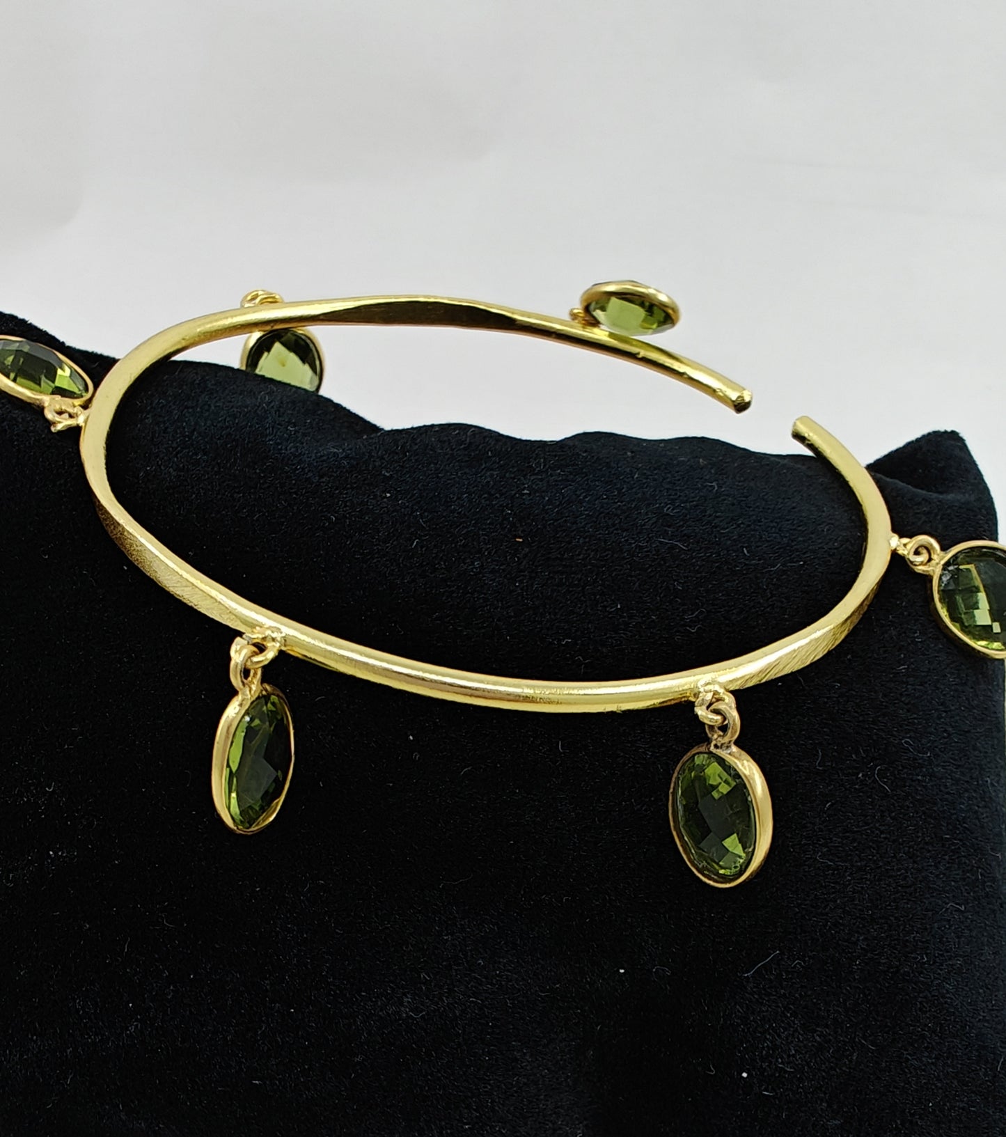 Bangle with stone hangings