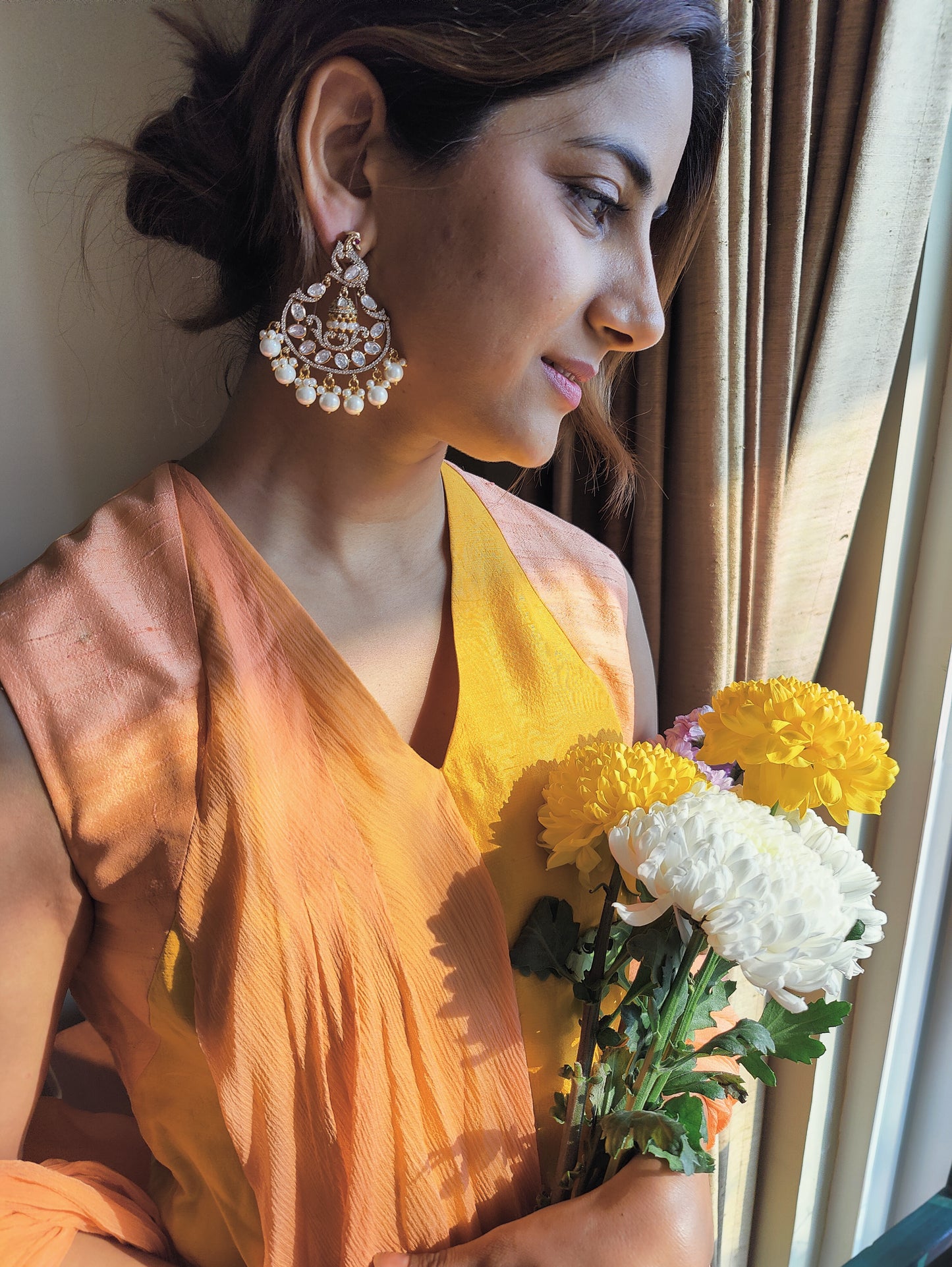 Ahana earrings with Bali in centre of peacock motif