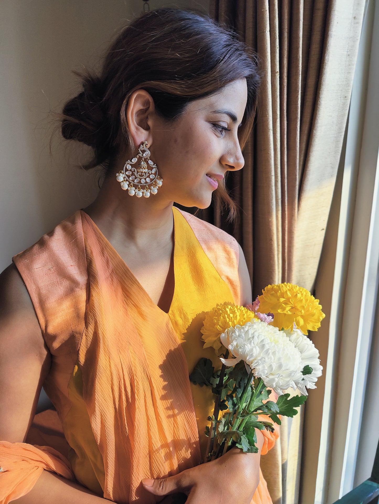 Ahana earrings with Bali in centre of peacock motif