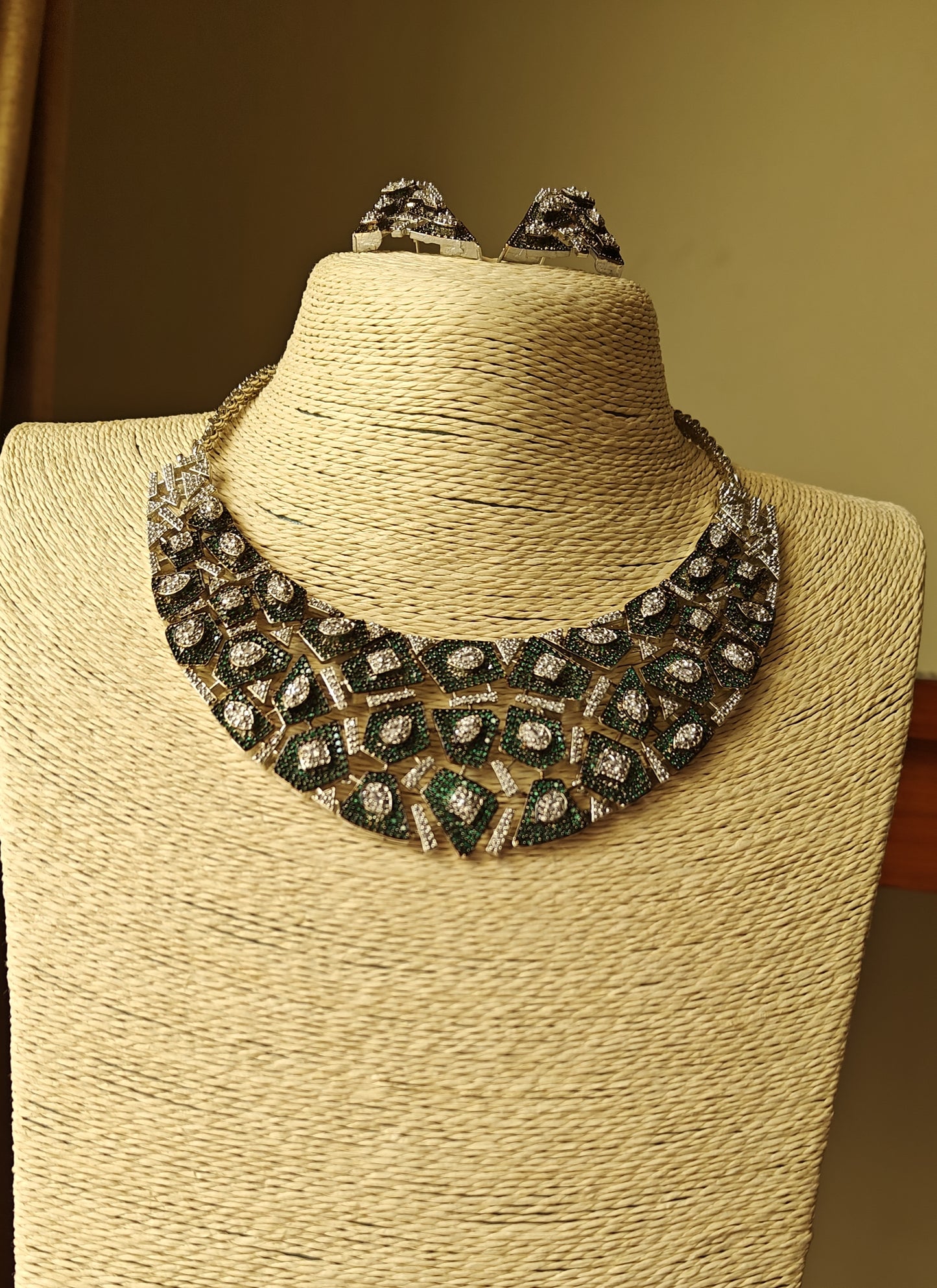 Ila set with emerald green nano stones pieces