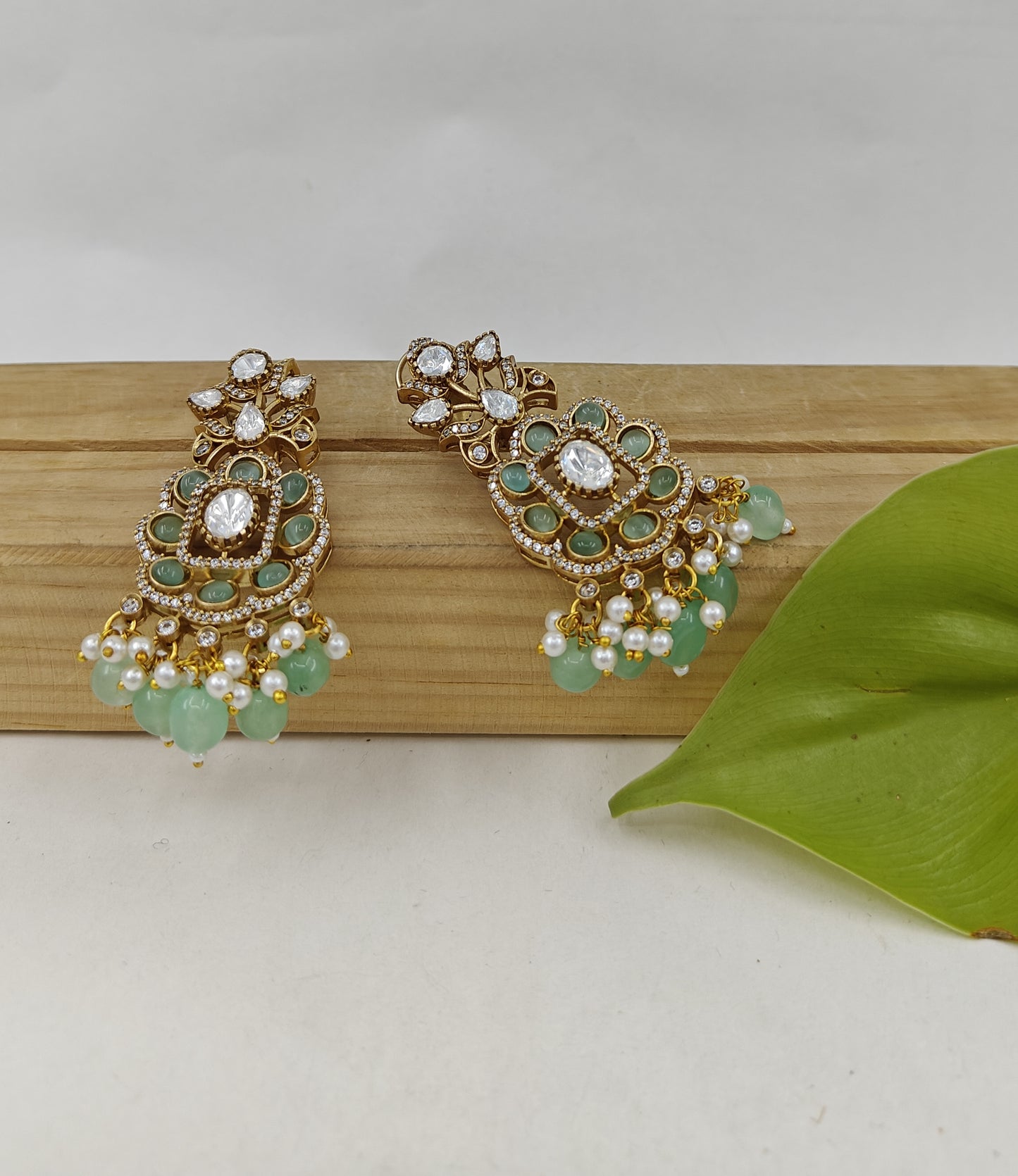 Faize earrings with kundan and mint green inlay