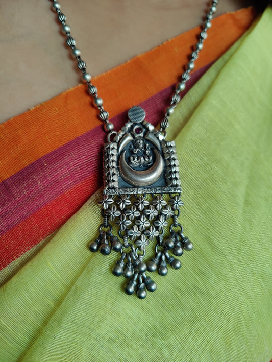 Narayani sterling silver necklace with Lakshmiji in the centre.