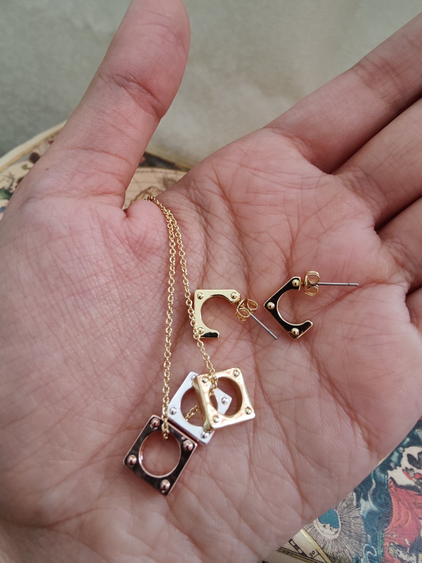Chitrani set with square pieces in gold,rose gold, rhodium