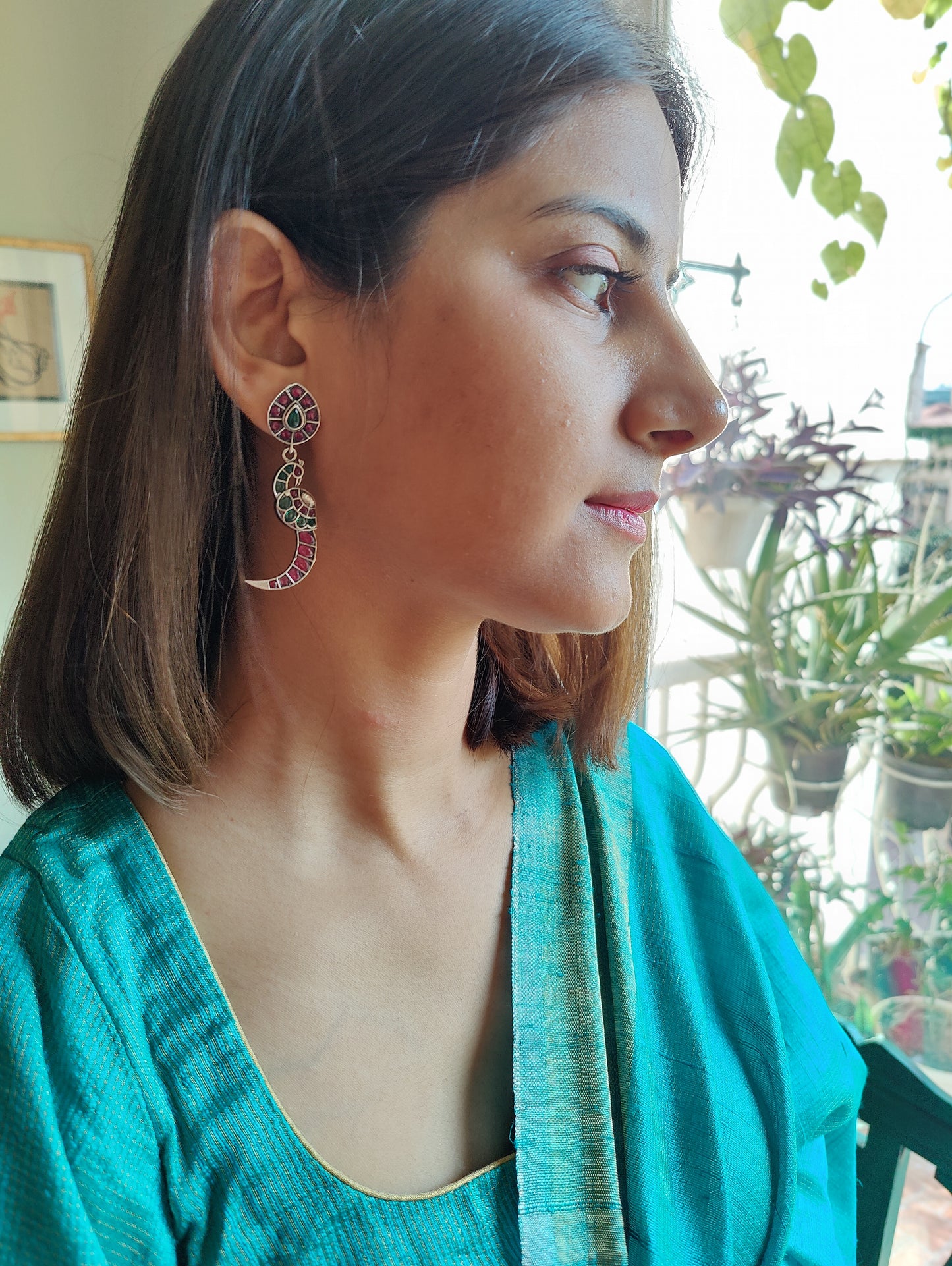 Bala silver peacock earrings with red and green stone