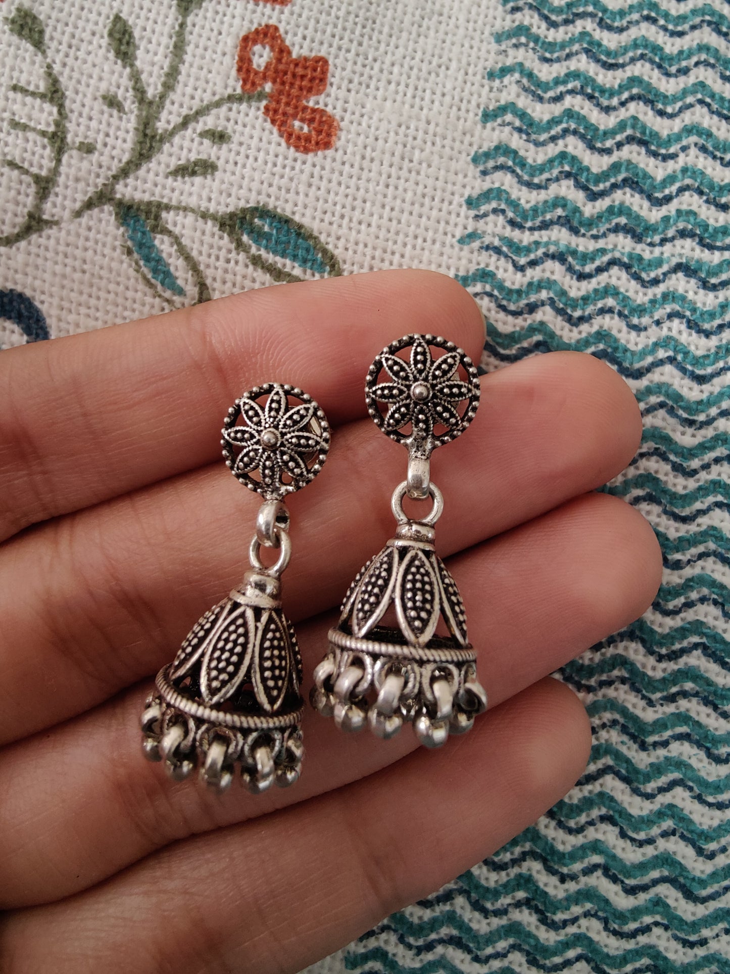 Dilber silver jhumkis with petals and beads