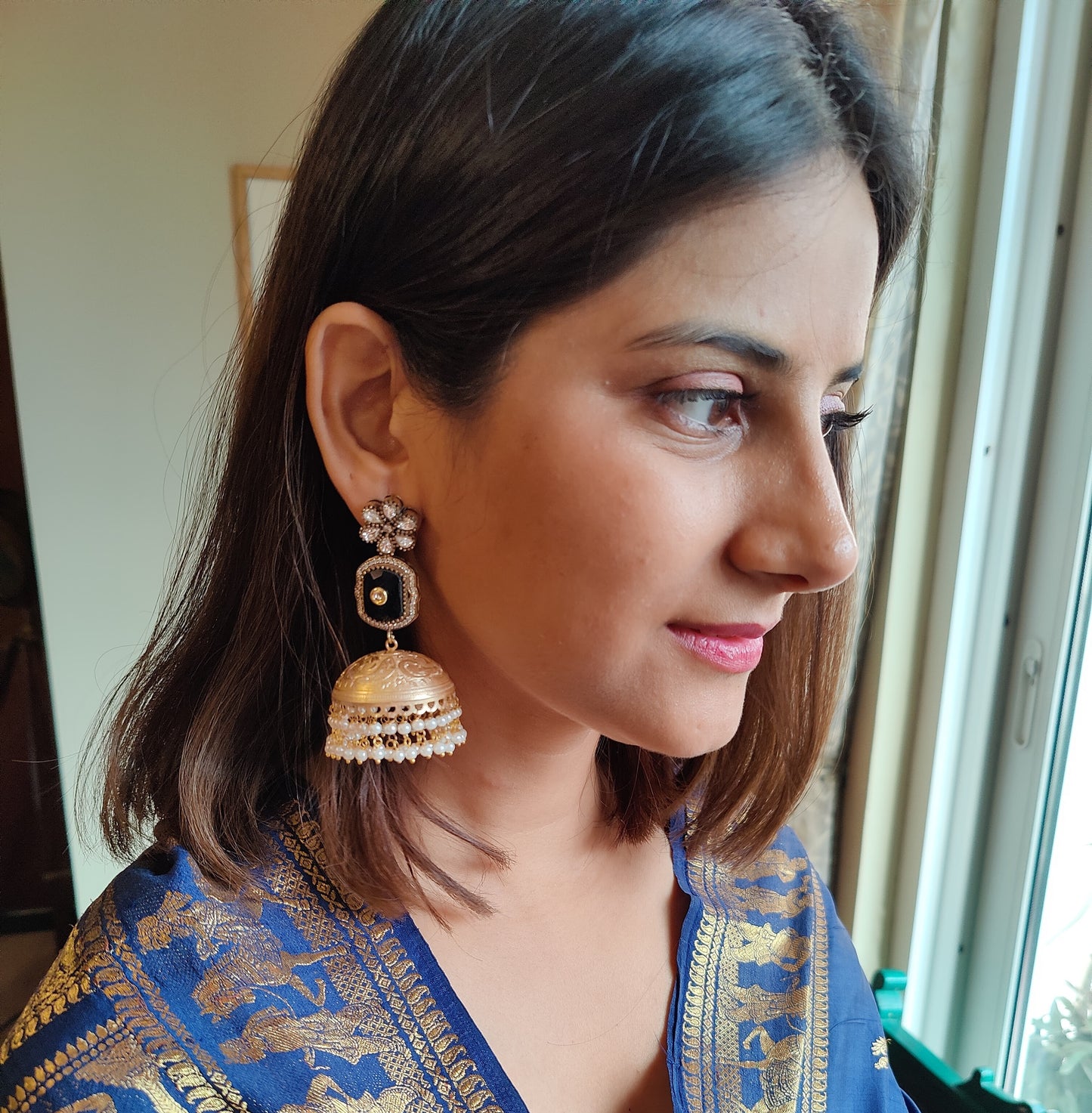 Kurangi kundan and stone jhumkas