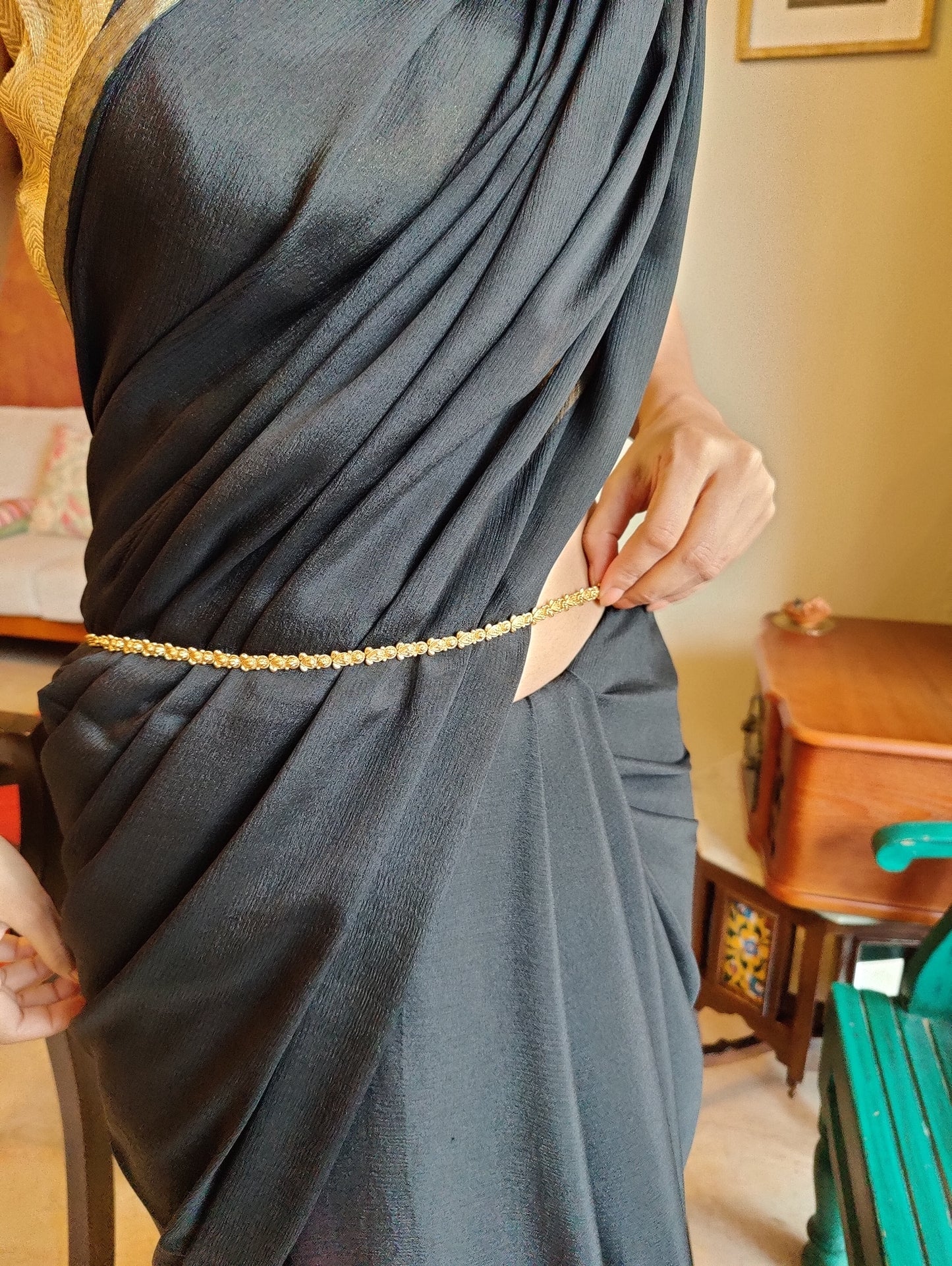 Kuvil belt with carved pieces all around