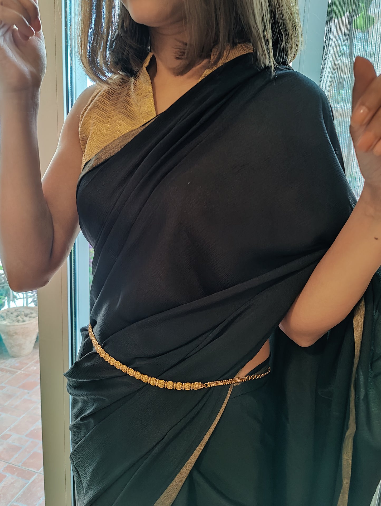 Kuvil belt with carved pieces all around