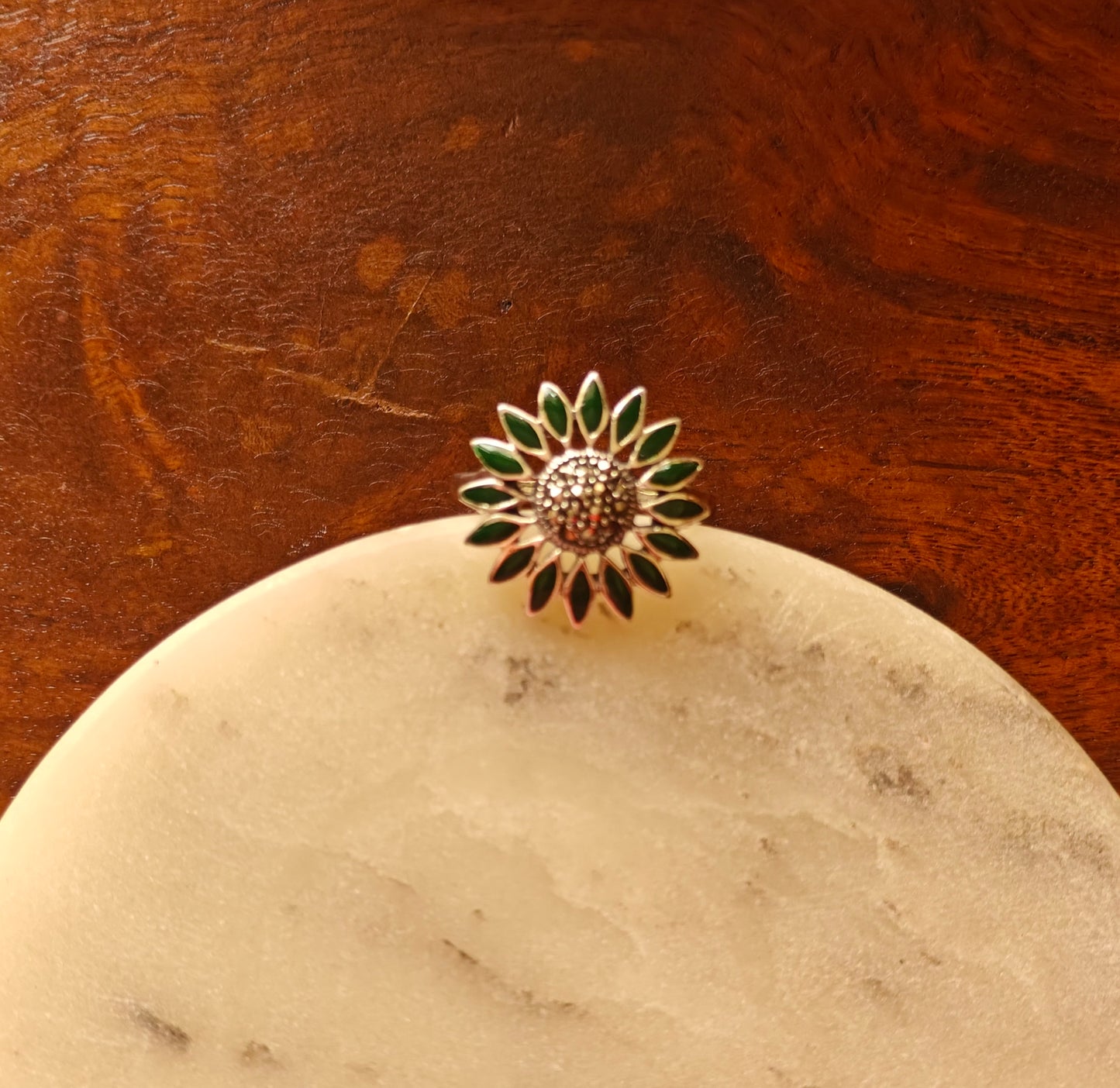 Flower silver ring with green petals