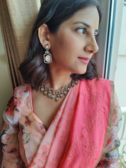 Geena set with moissanite and emerald green stone