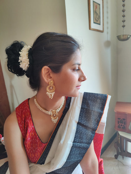 Ira set with pearls and gold