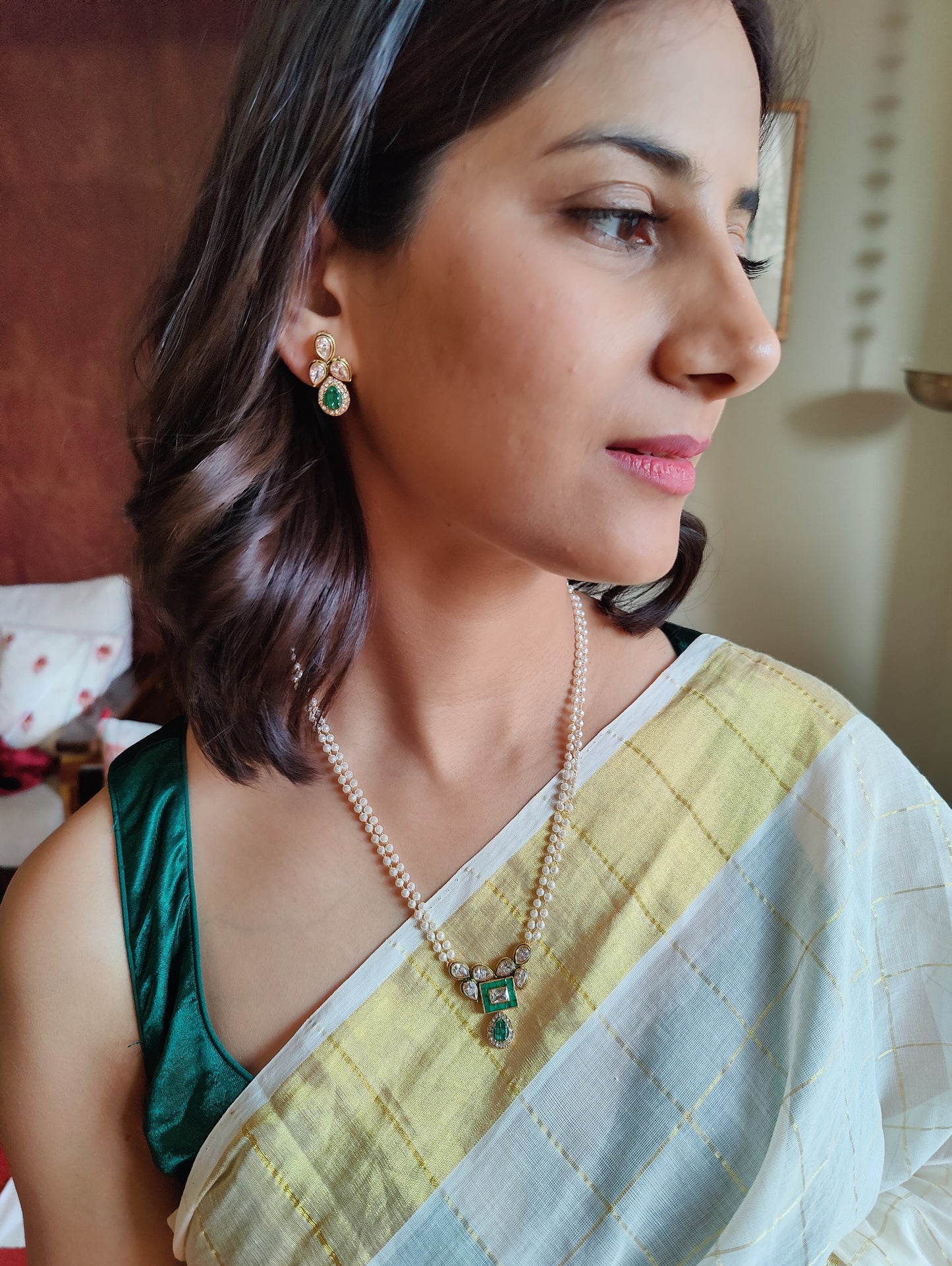 Madhumati set with kundan and stone on pearl strings