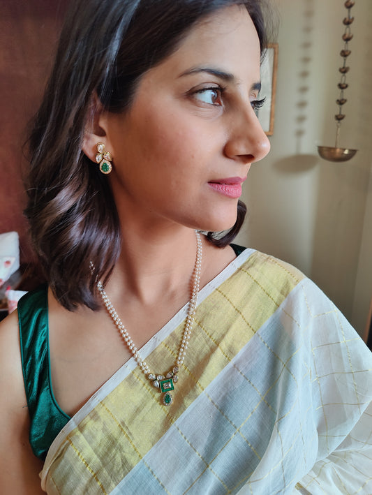 Madhumati set with kundan and stone on pearl strings