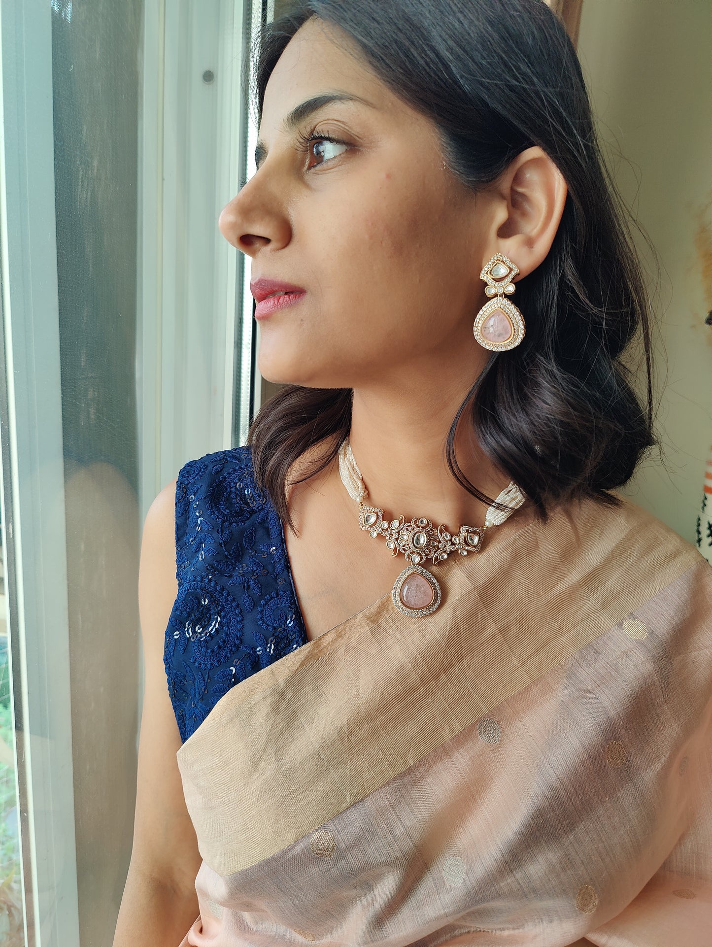 Nirupa choker set with stone and  moissanite on poth pearl strings