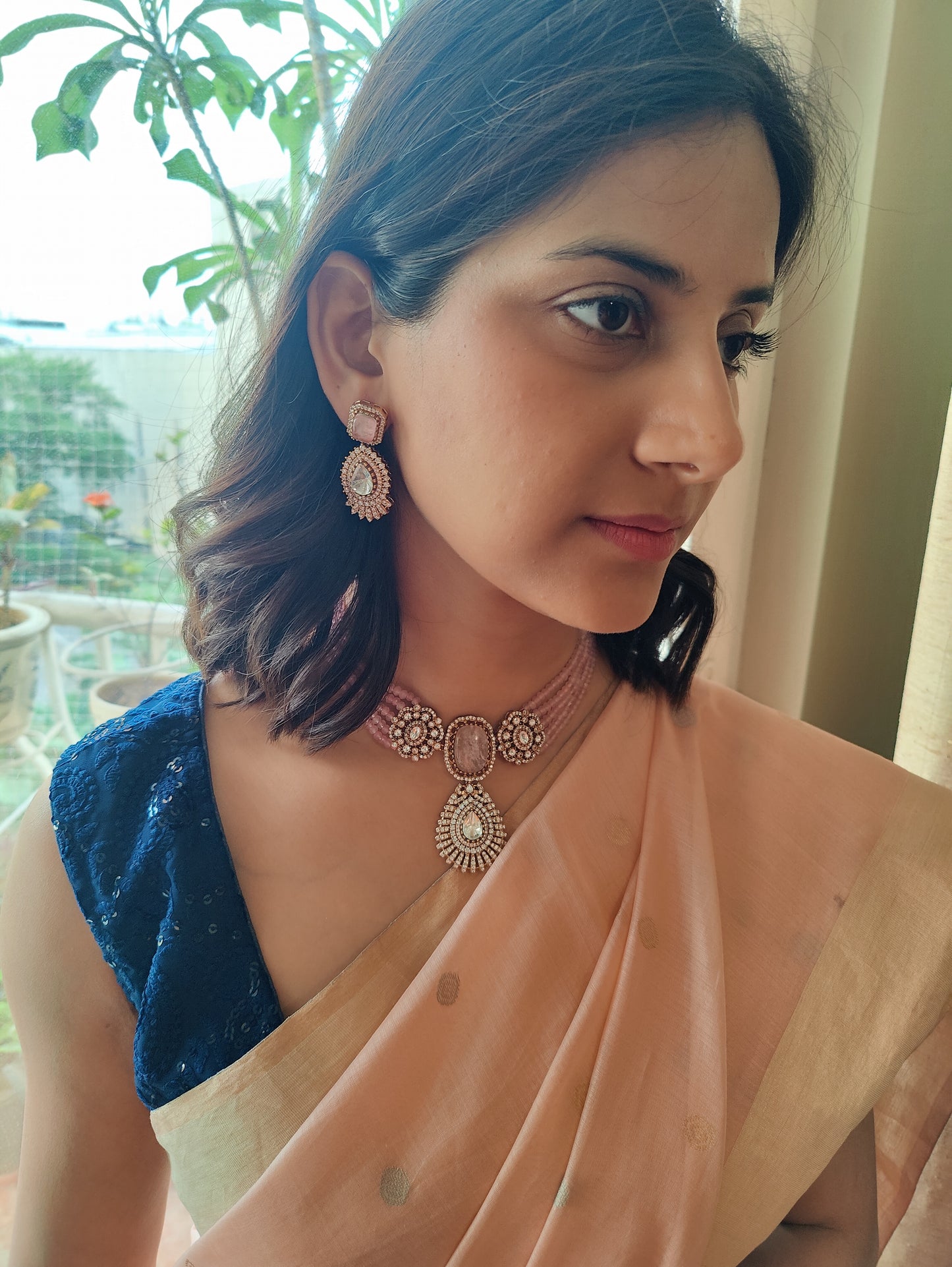 Padmal five strings choker set with central piece with stone and moissanite