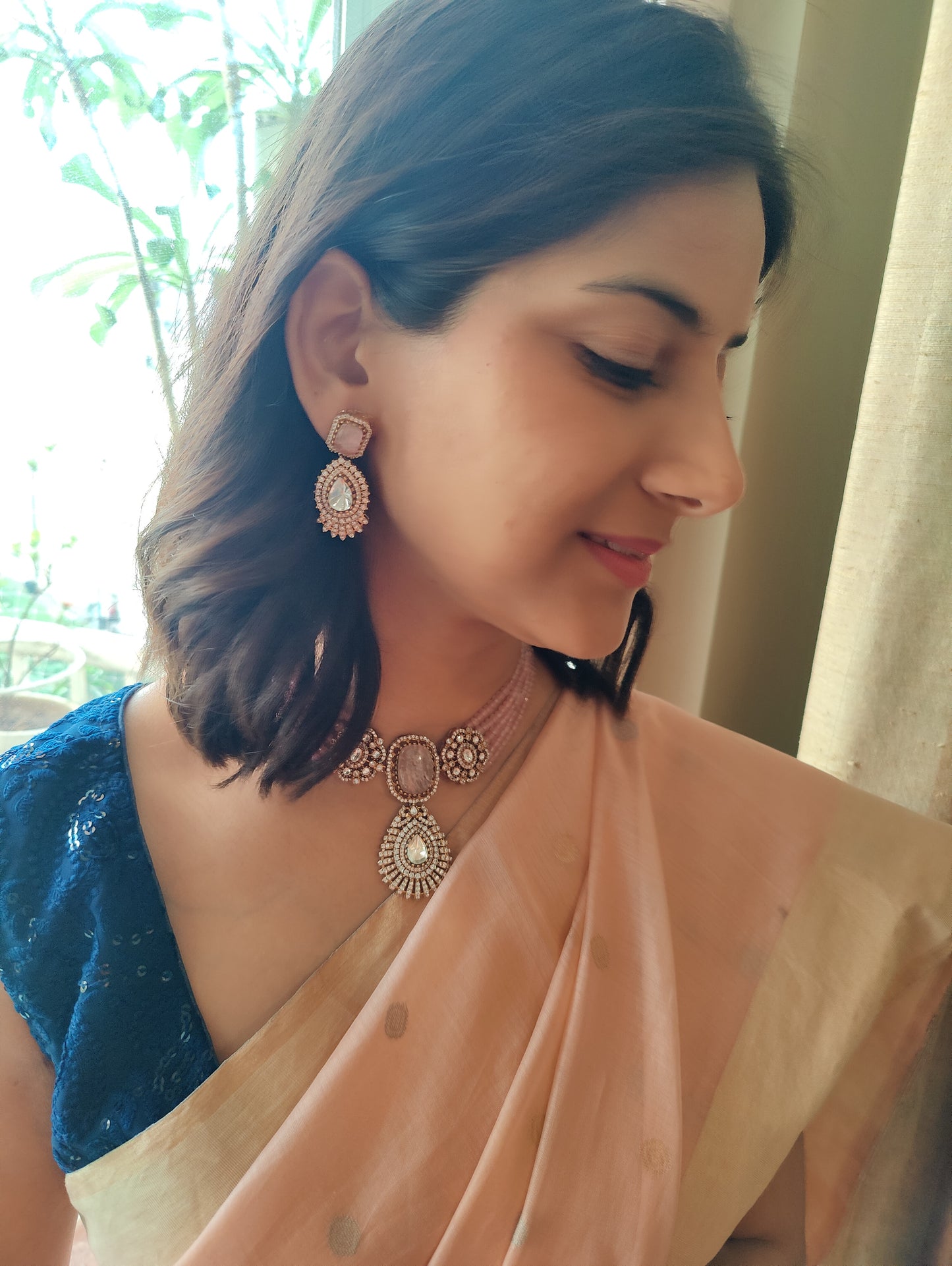 Padmal five strings choker set with central piece with stone and moissanite