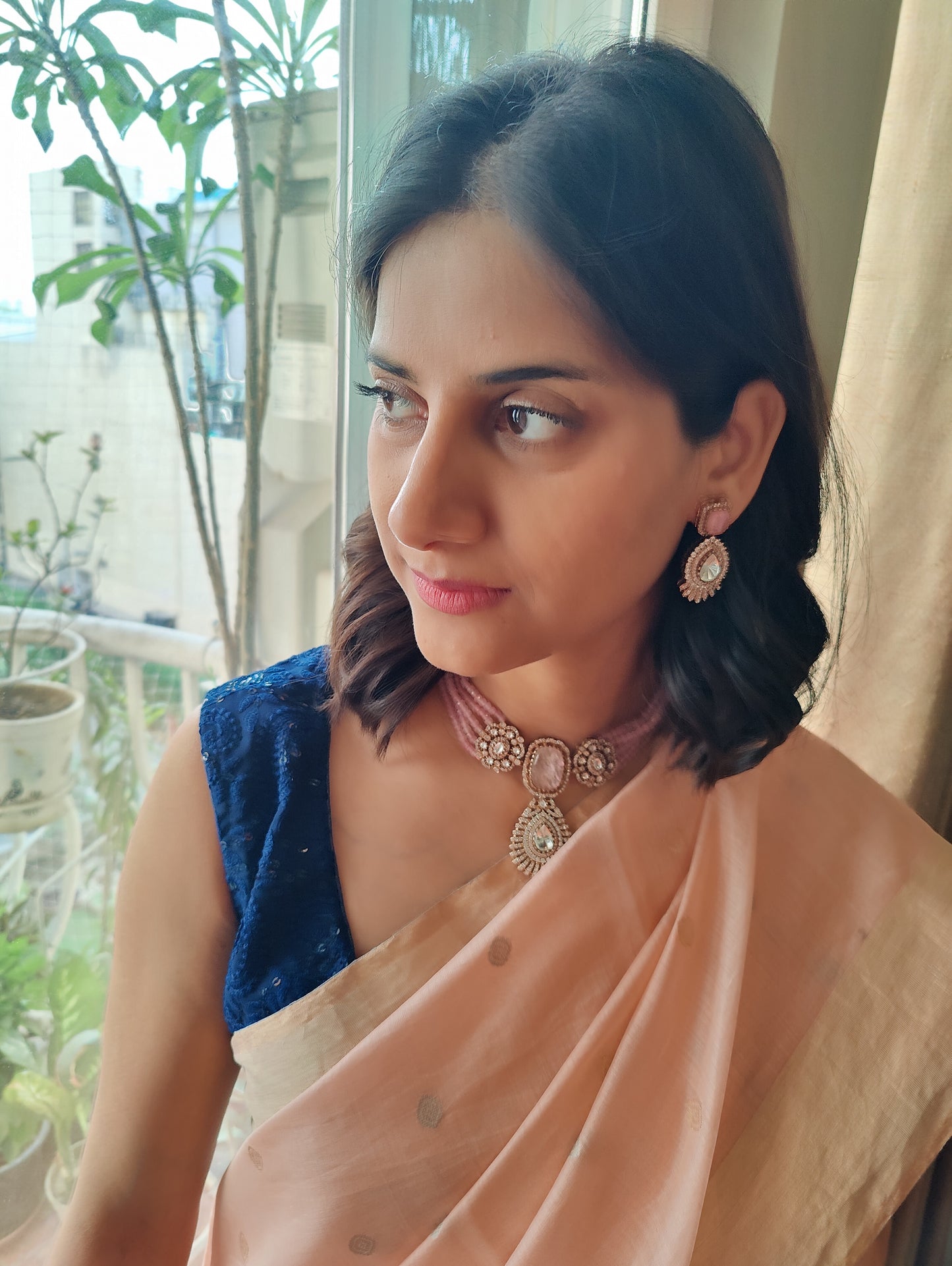 Padmal five strings choker set with central piece with stone and moissanite