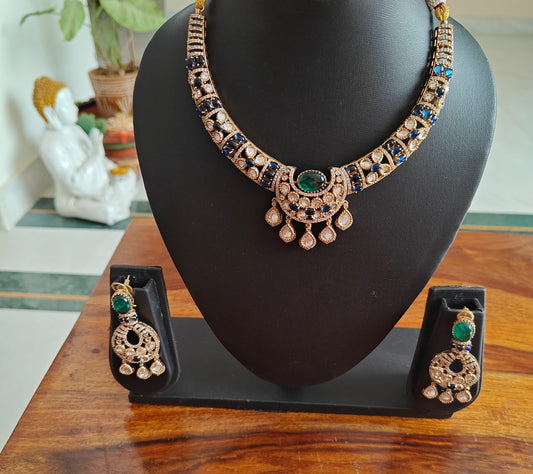 Madhushri set with moissanite and coloured stones